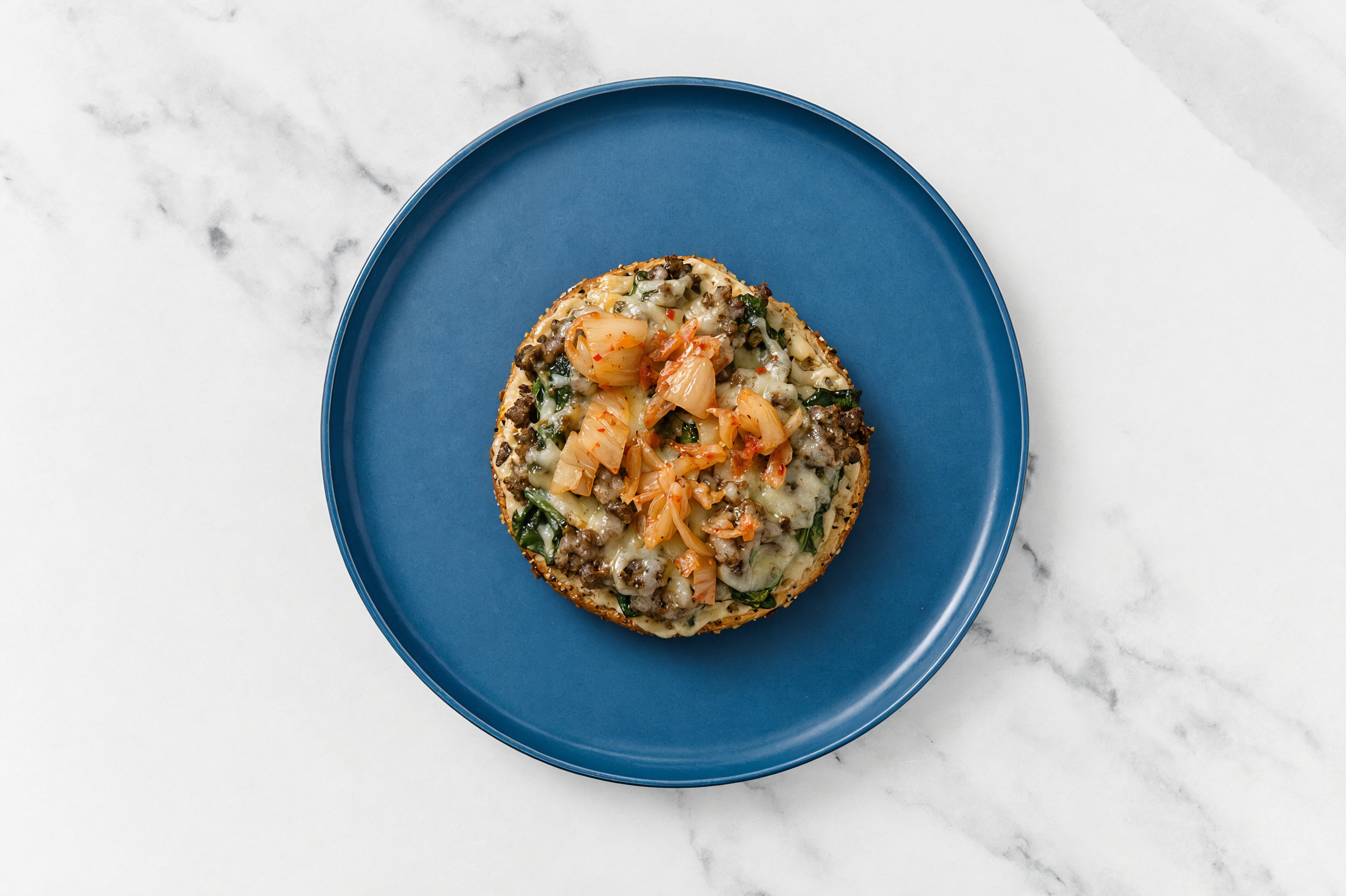 Truffle Ground Beef + Spinach Pizza Gluten Free Seeded Herb & Garlic Bagels with Kimchi