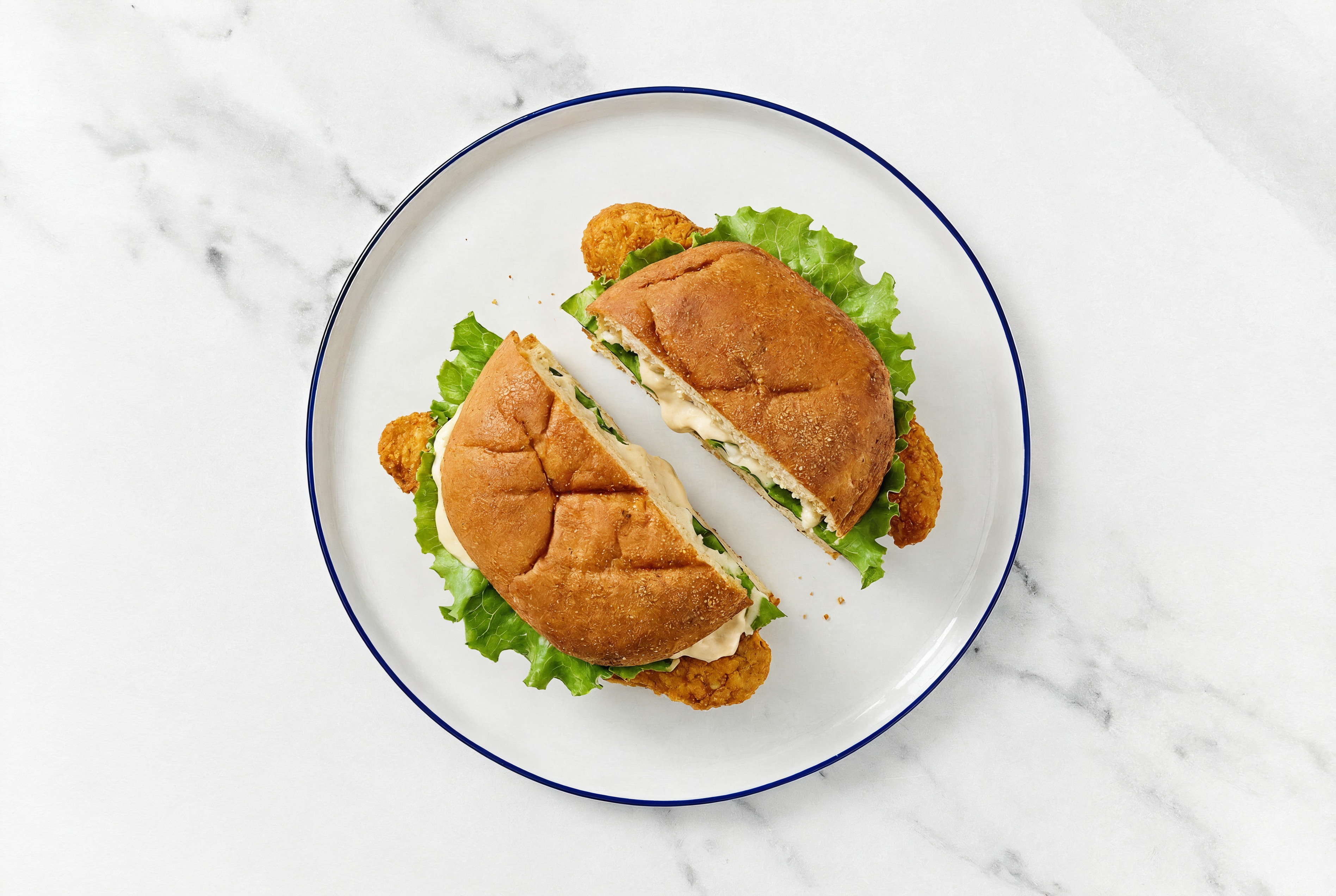 Creamy Horseradish "Chicken" Tenders Sandwich with Green Leaf Lettuce on Gluten-Free Buns