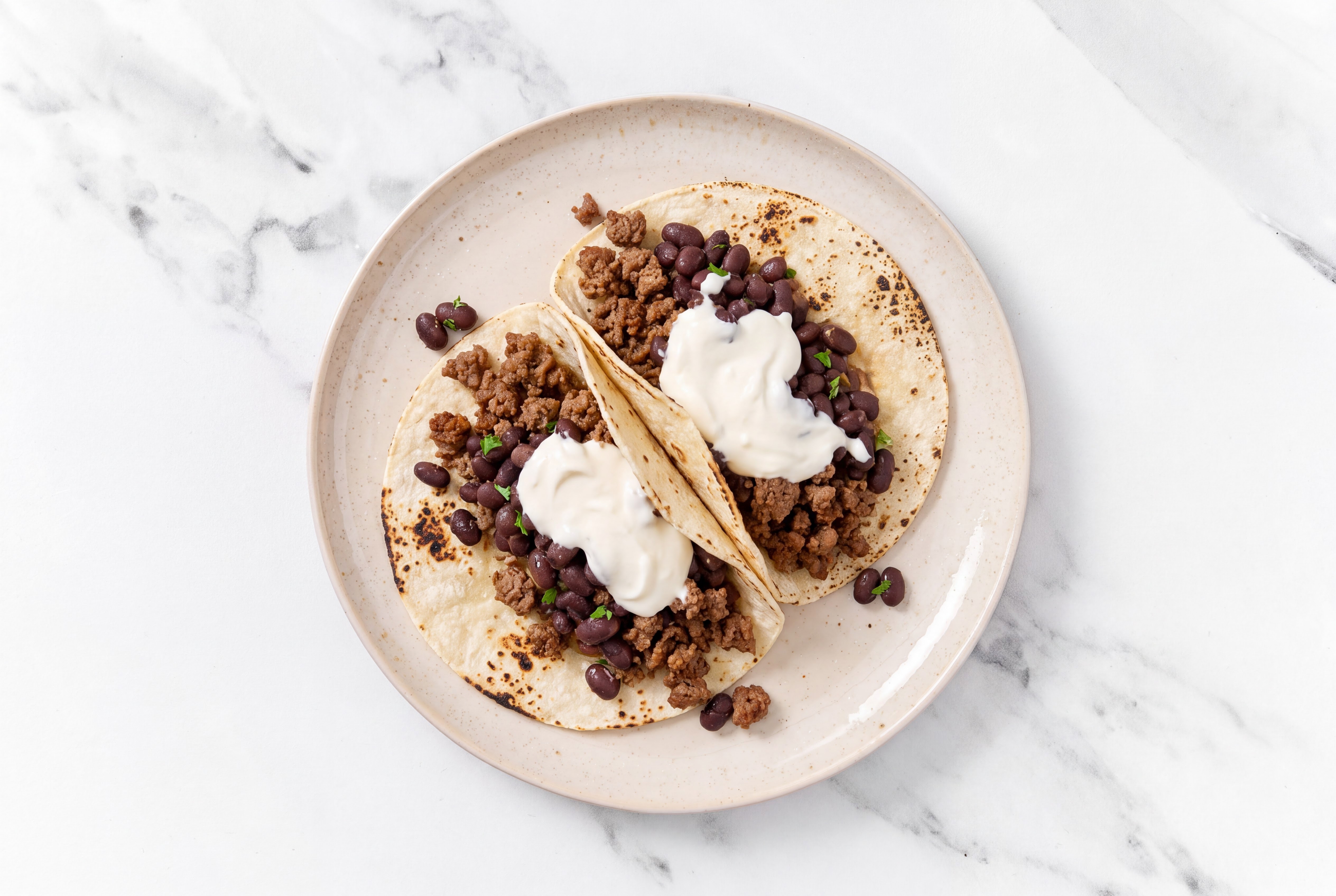 Hearty Ground 93/7 Lean Beef Tacos with Crema & Spiced Beans