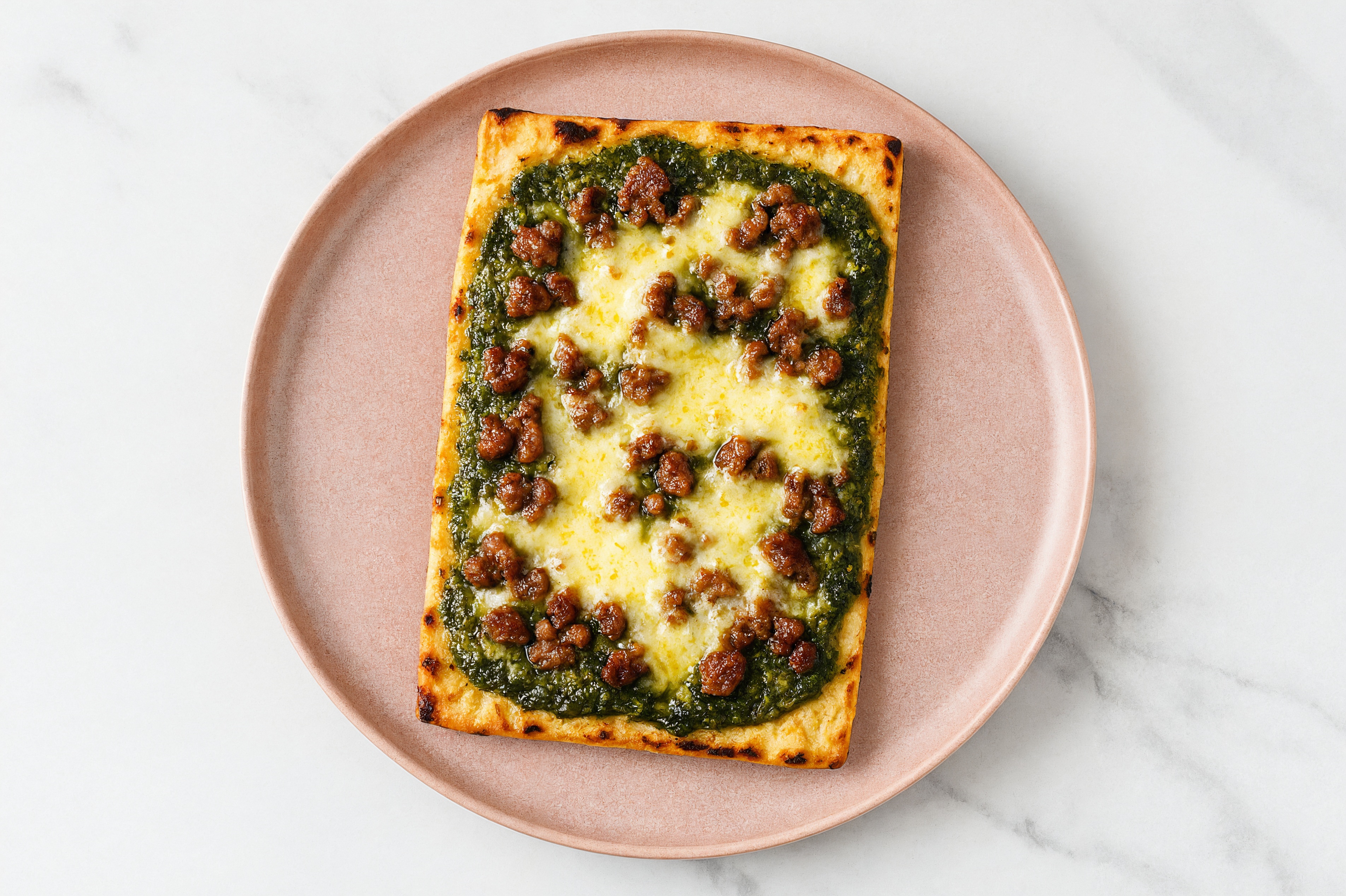 Pesto Ground Beef Pizza with Grated Parmesan Cheese