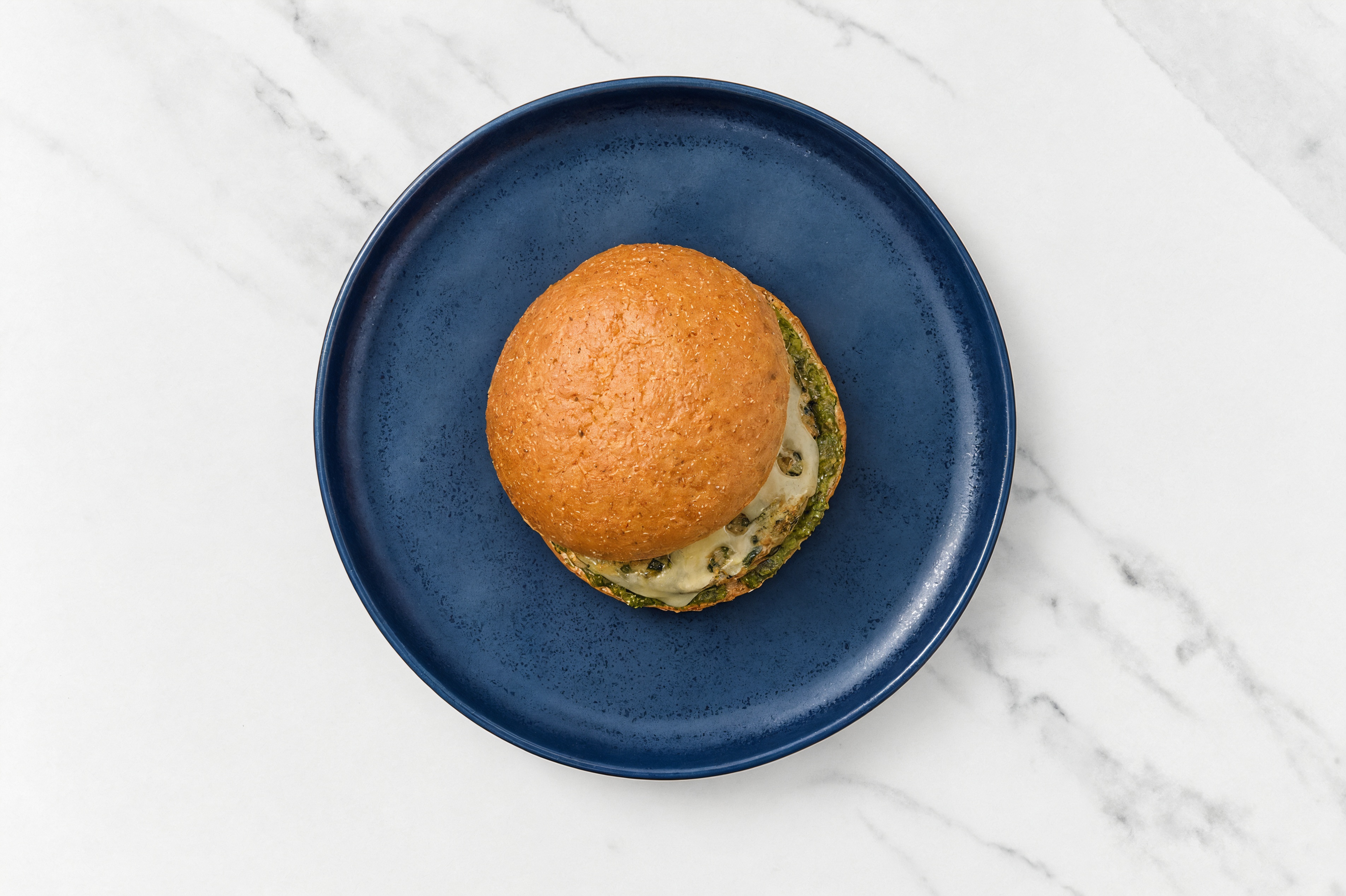 Garlic Turkey Burger on Sprouted Grain with Spinach Pesto & Swiss