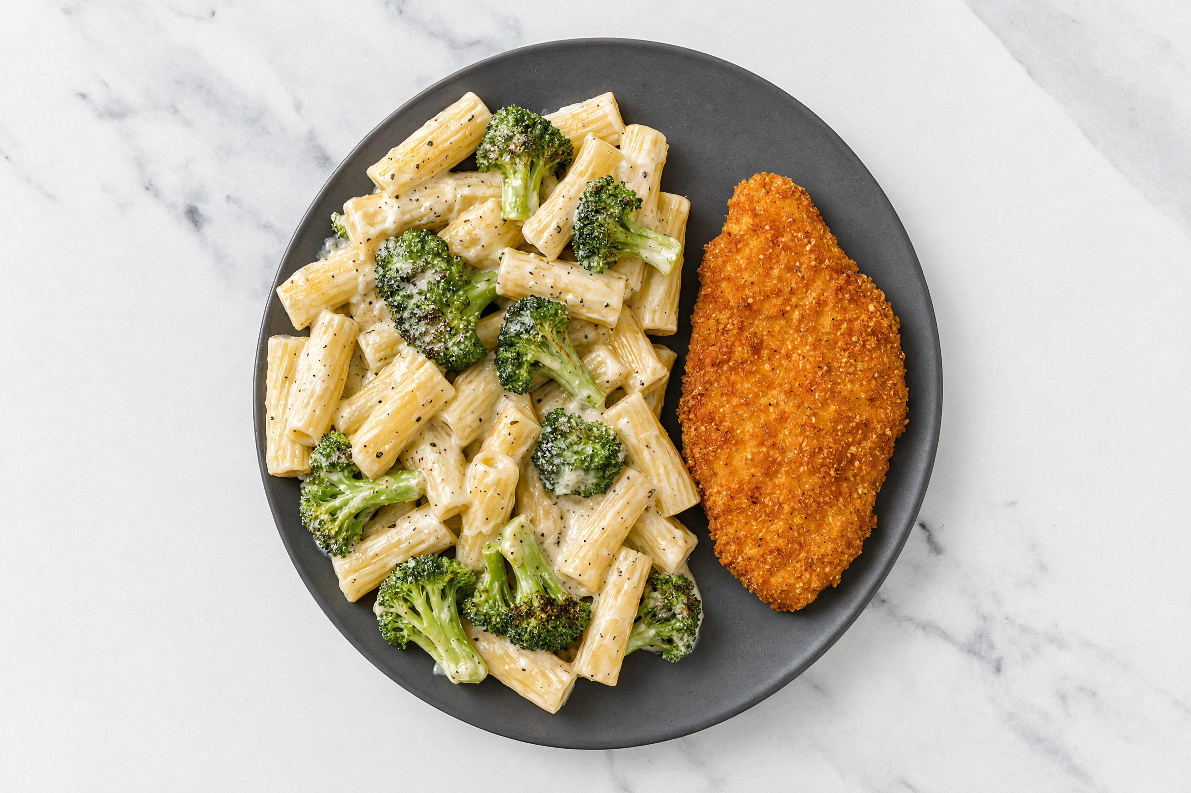 Crispy Hot Honey Chicken over Alfredo Rigatoni with Broccoli