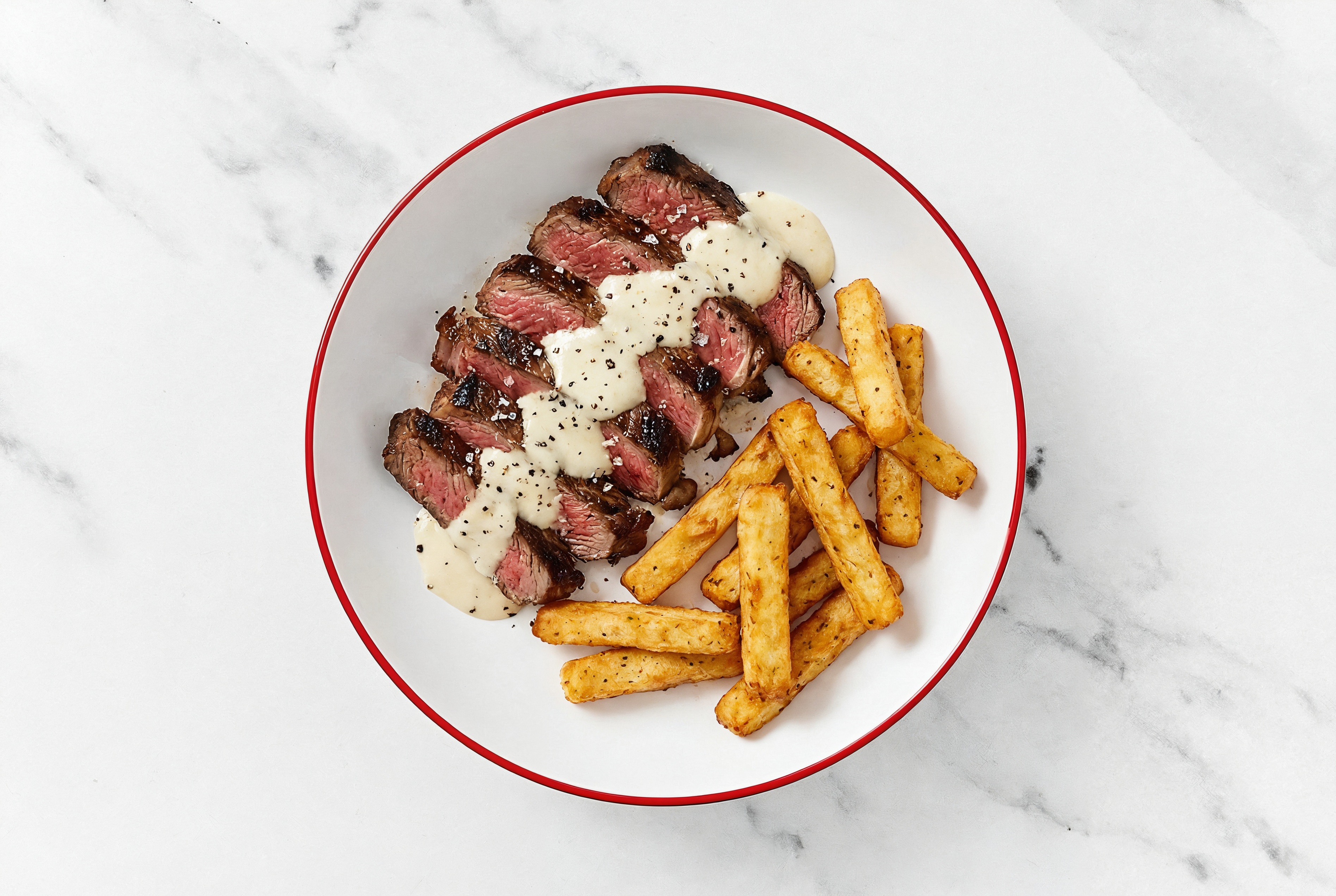Ribeye Steak with Garlic Sauce + Russet Fries