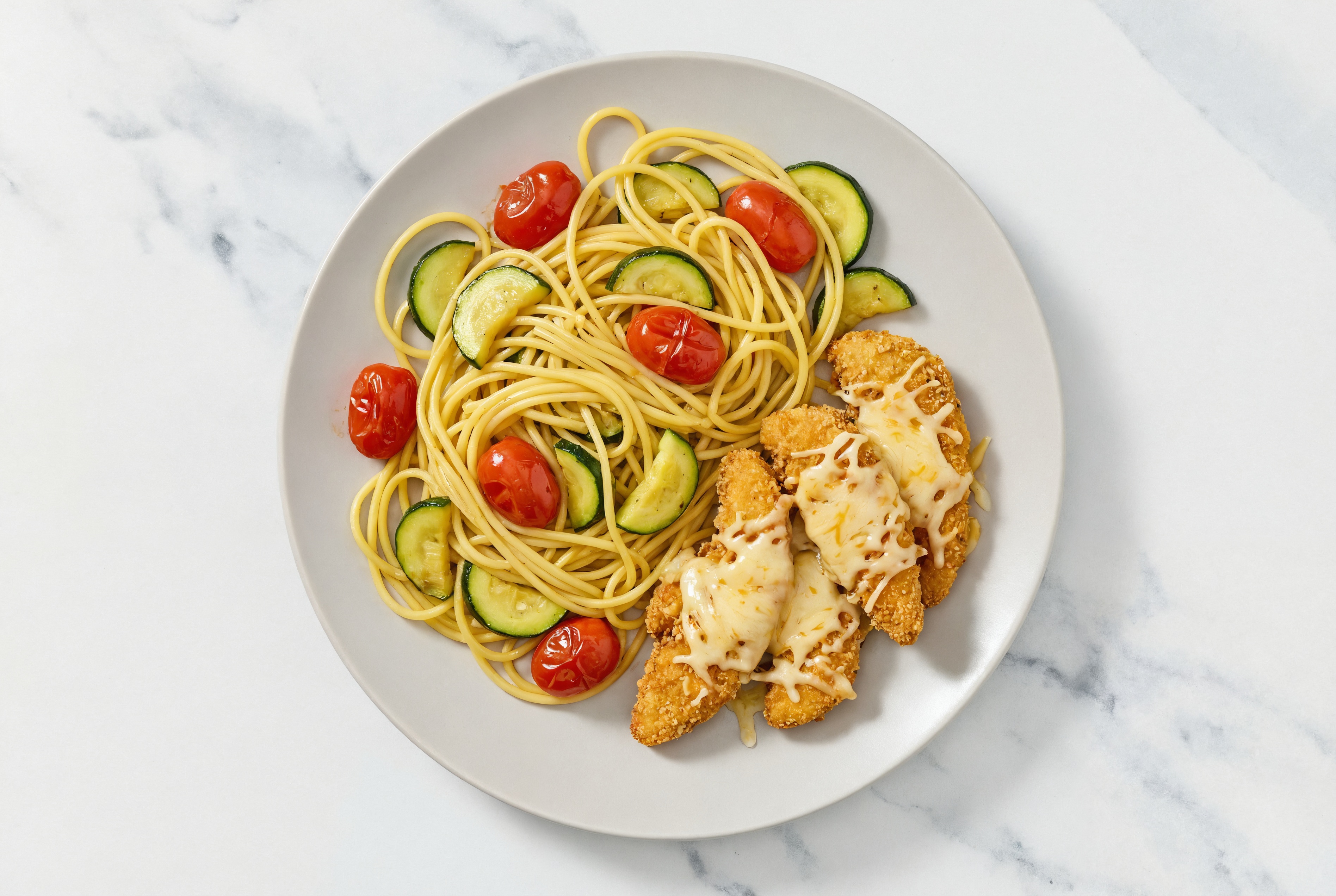 Gluten Free Spaghetti + Chick'n Tenders with Zucchini + Vegan Cheese