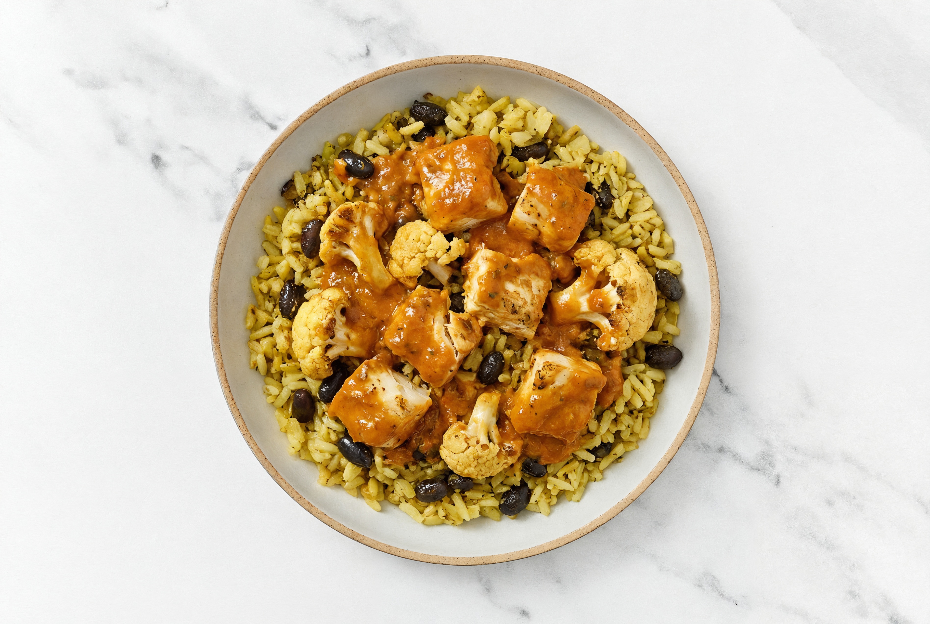 Halibut Tikka Masala over  Rice with Beans
