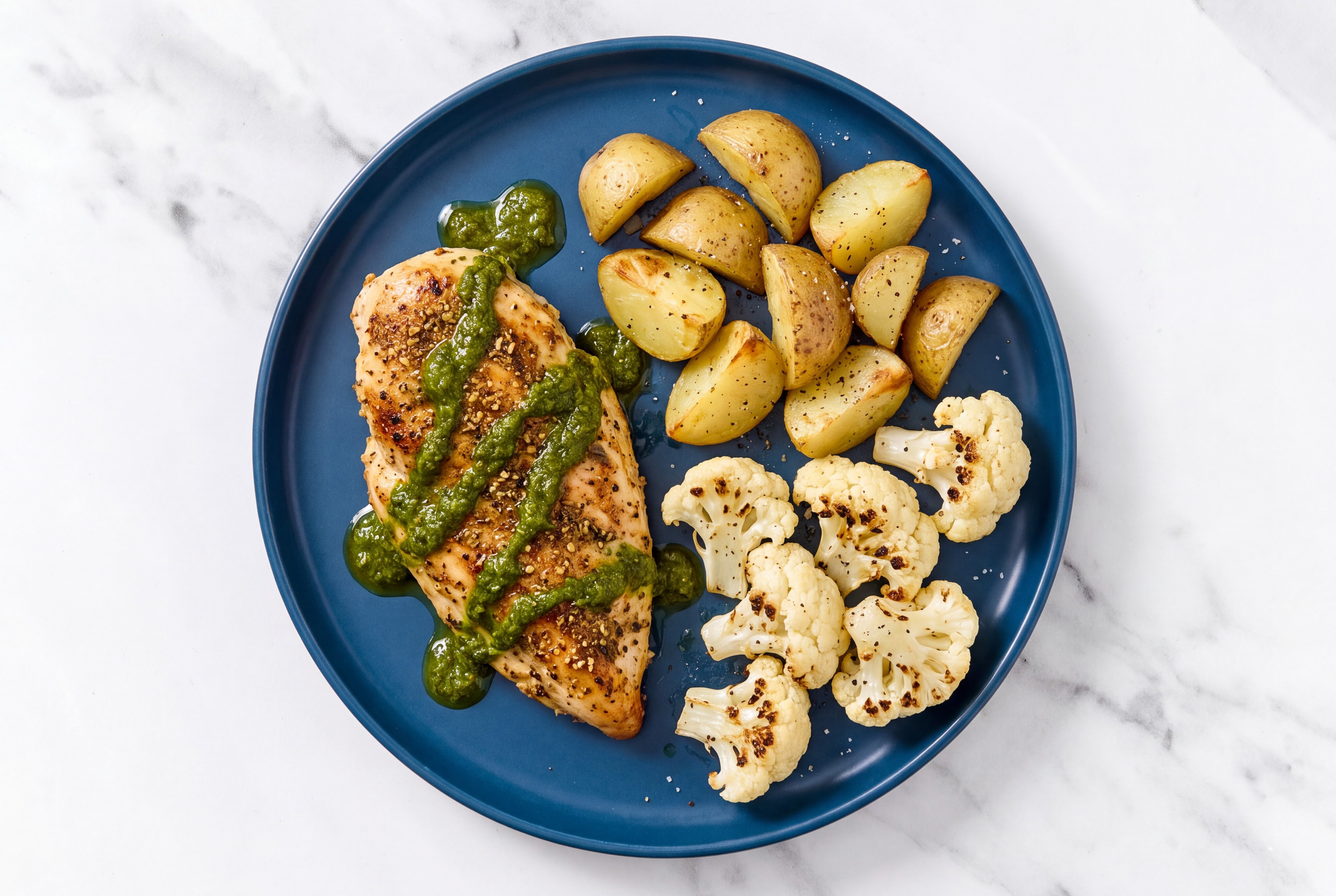 Blackened Chicken with Fingerling Yellow Potatoes + Cauliflower Florets