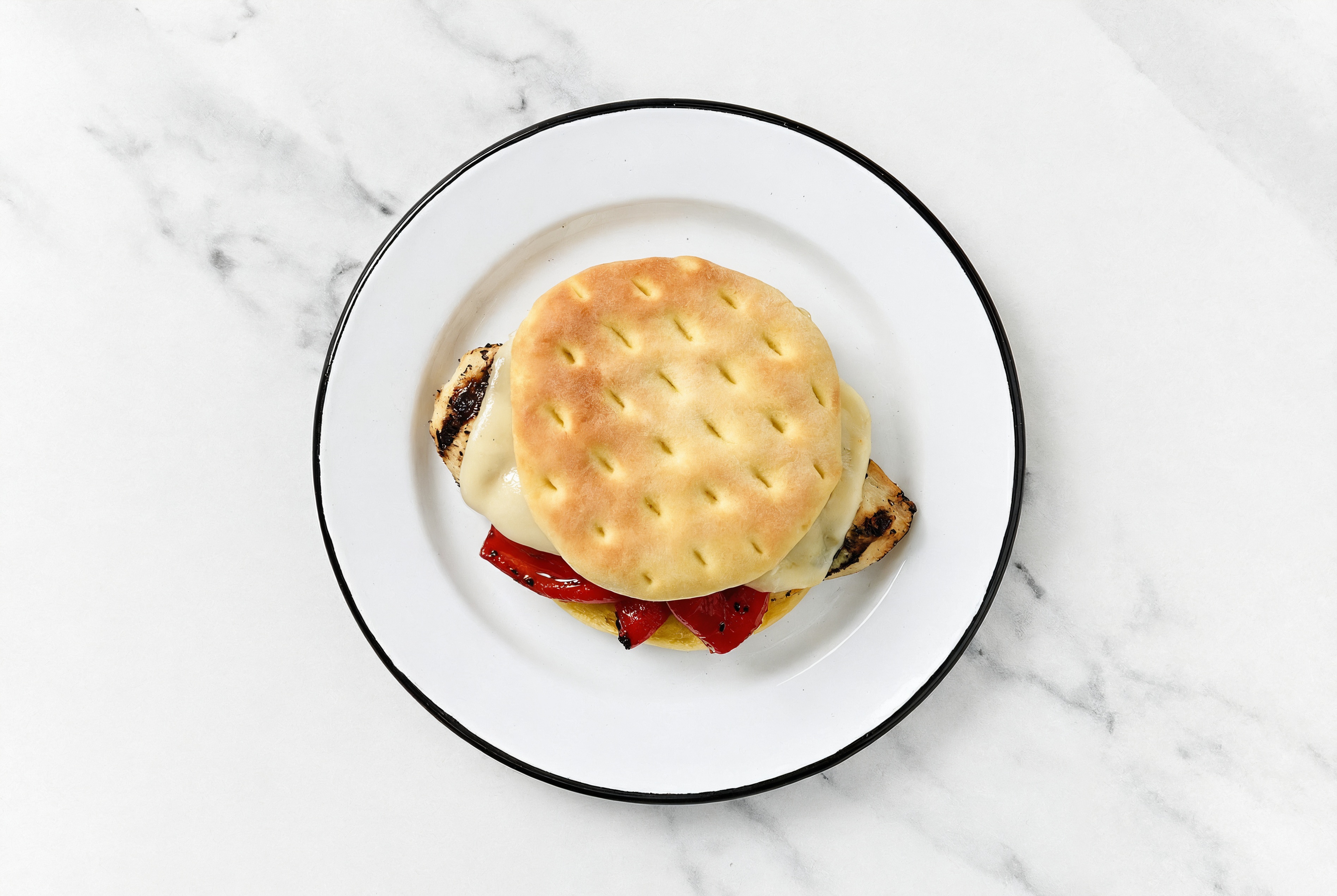 Hearty Grilled Seasoned Chicken Breast Sandwich with Cheese + Peppers