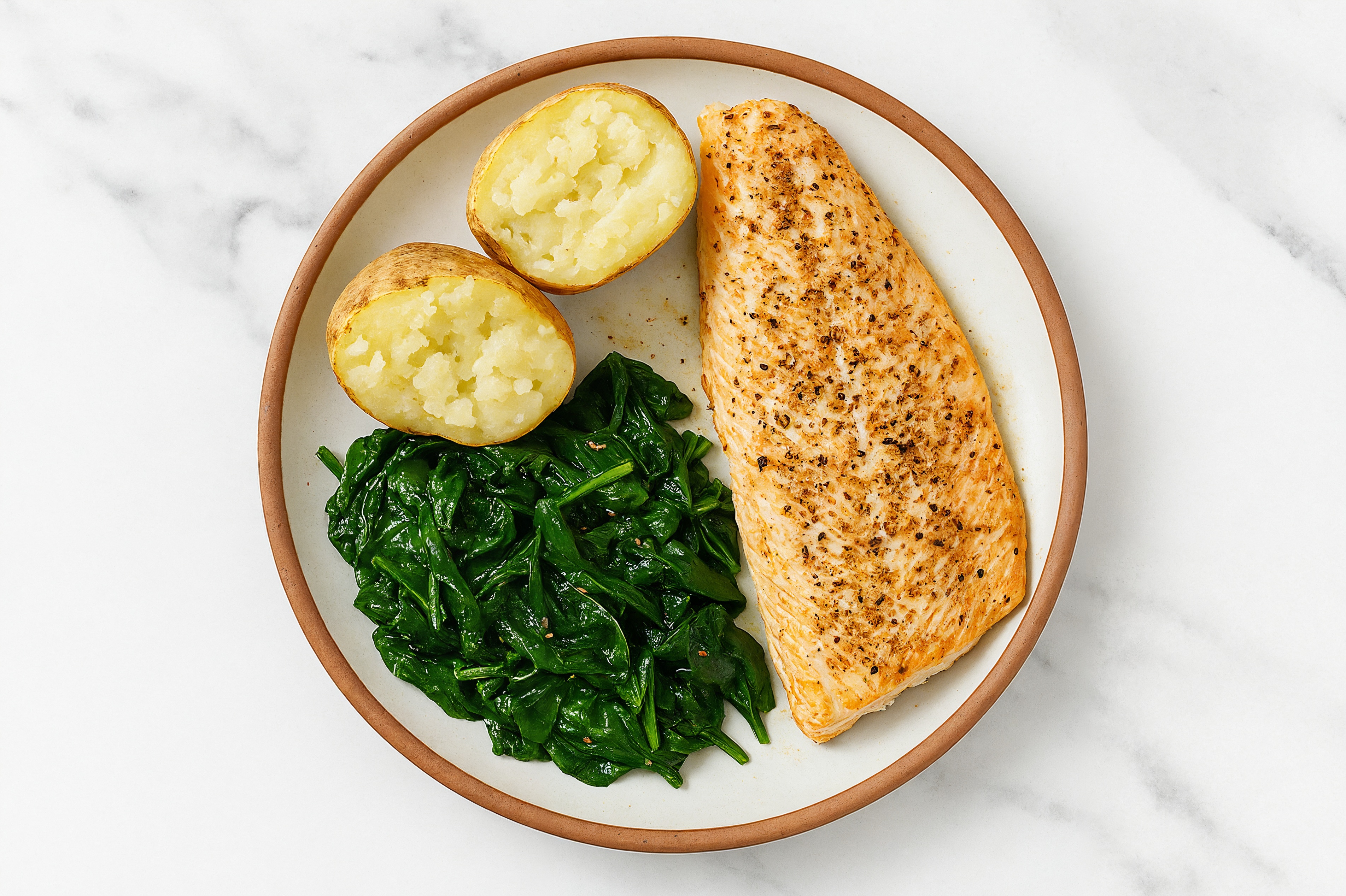 Roasted Honey Herb Steelhead Trout with Sautéed Baby Spinach