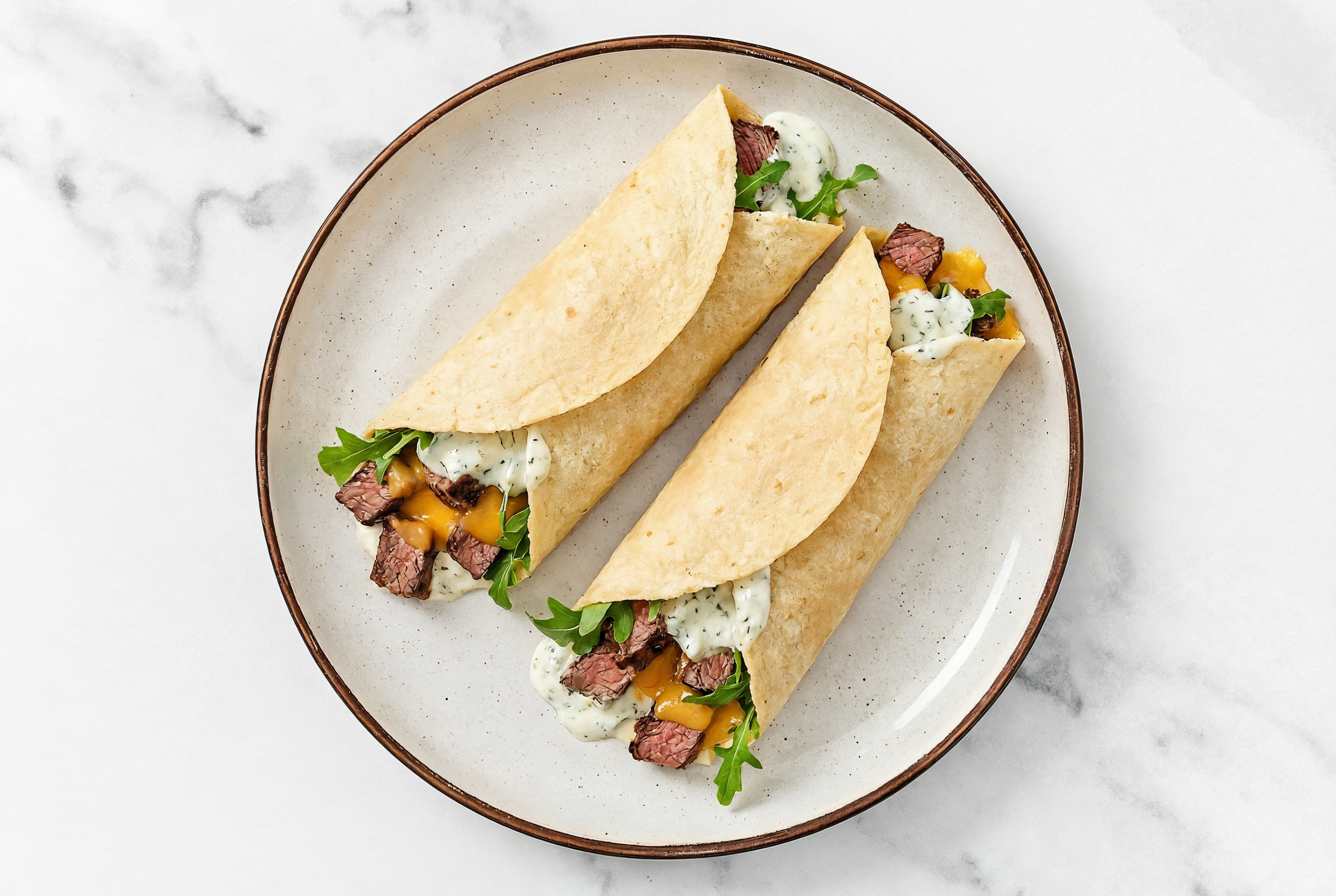 Tzatziki Sliced Steak + Cheddar Tortilla Wraps with Arugula