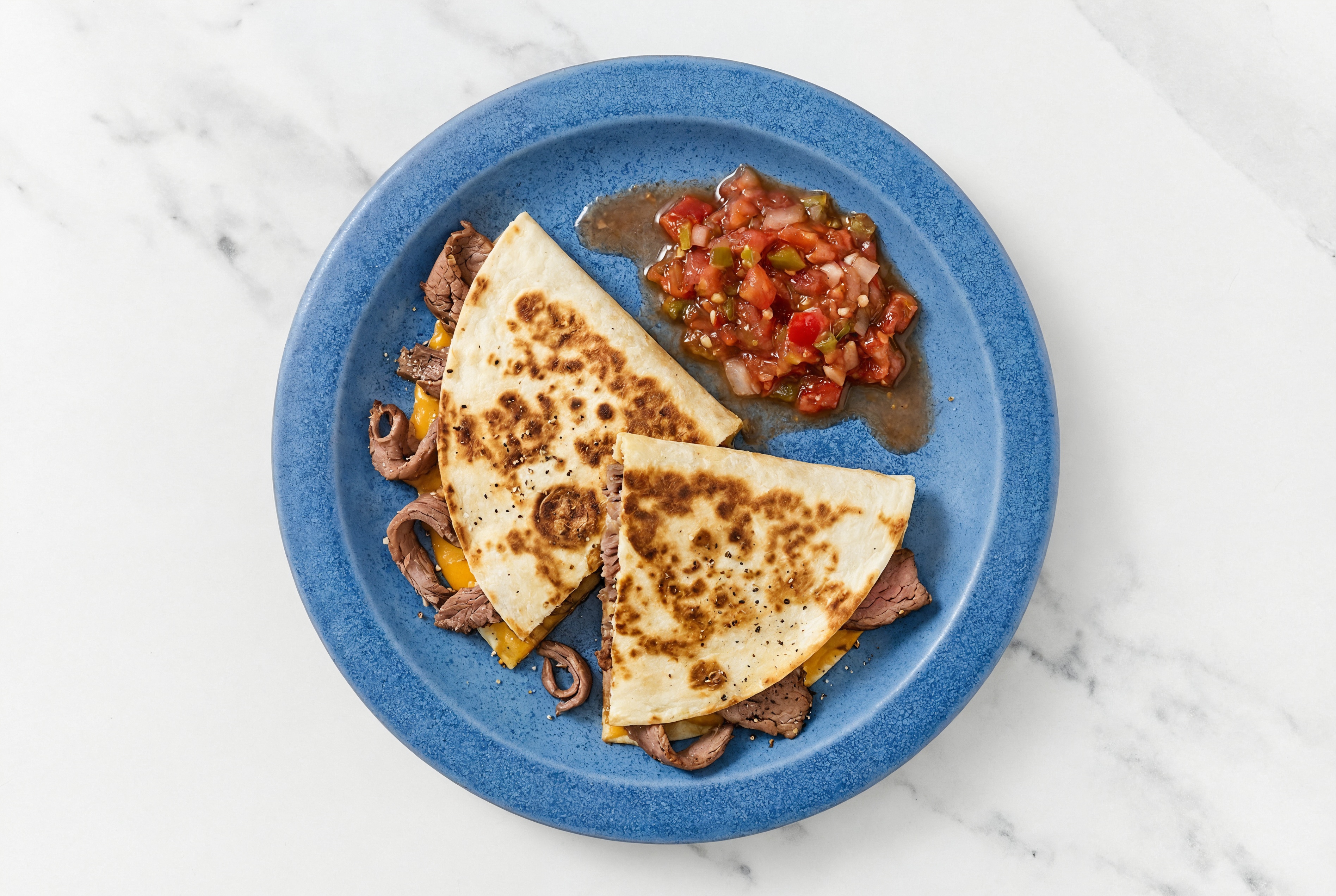 Cheesy Shaved Steak + Salsa Quesadillas