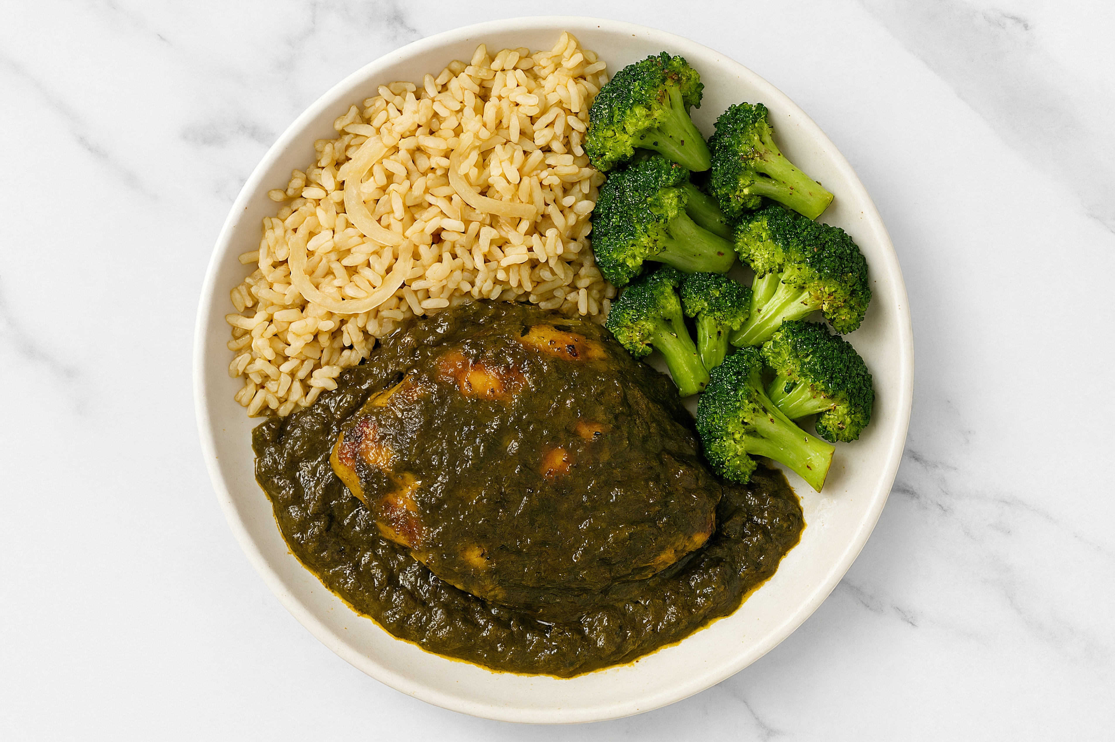 Stove-Top Chicken Saag + Caramelized Onion Rice Pilaf with Broccoli Florets