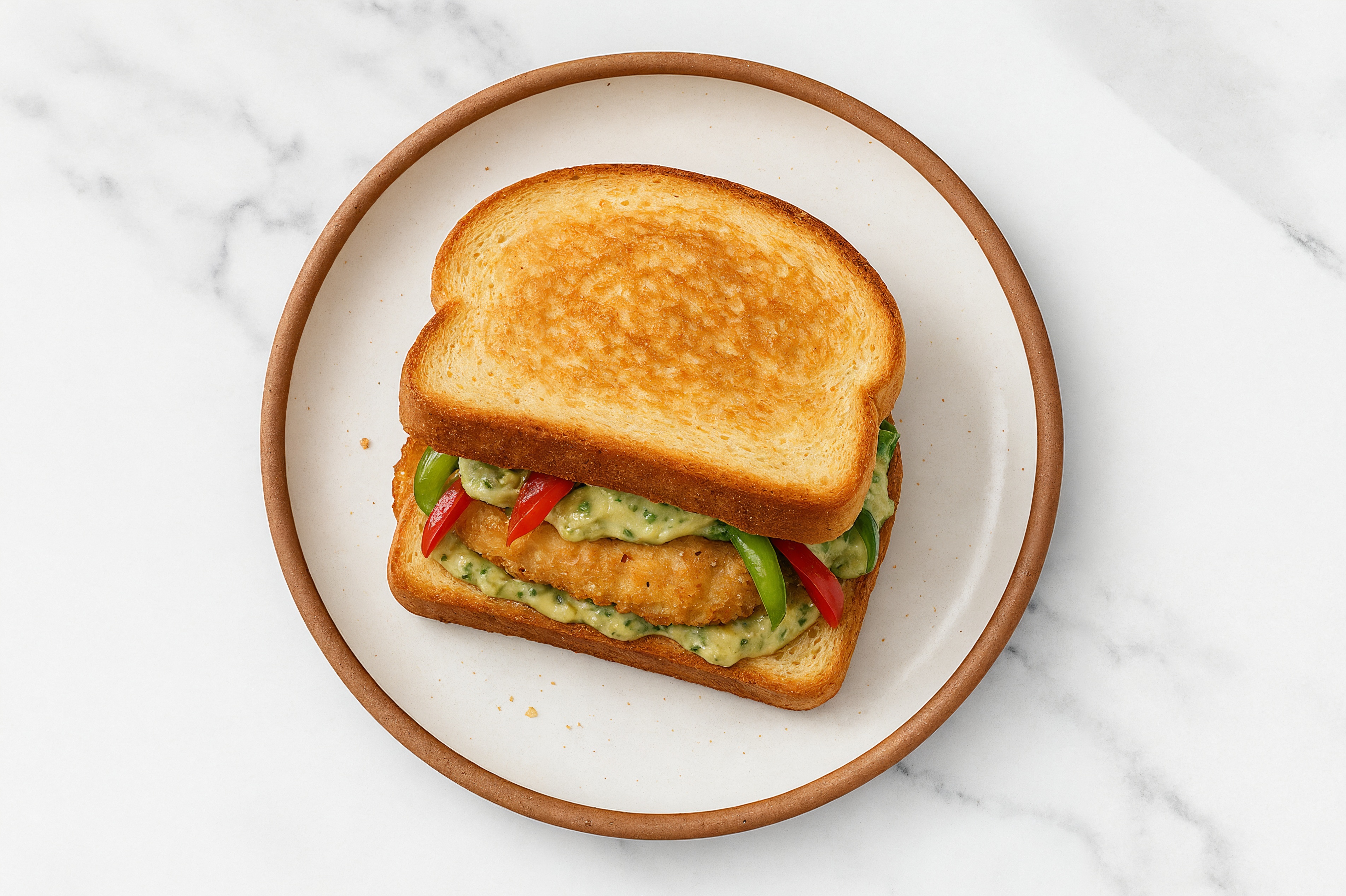 Creamy Artichoke "Chicken" Tenders Sandwich with Peppers + Onion on Honey White Bread