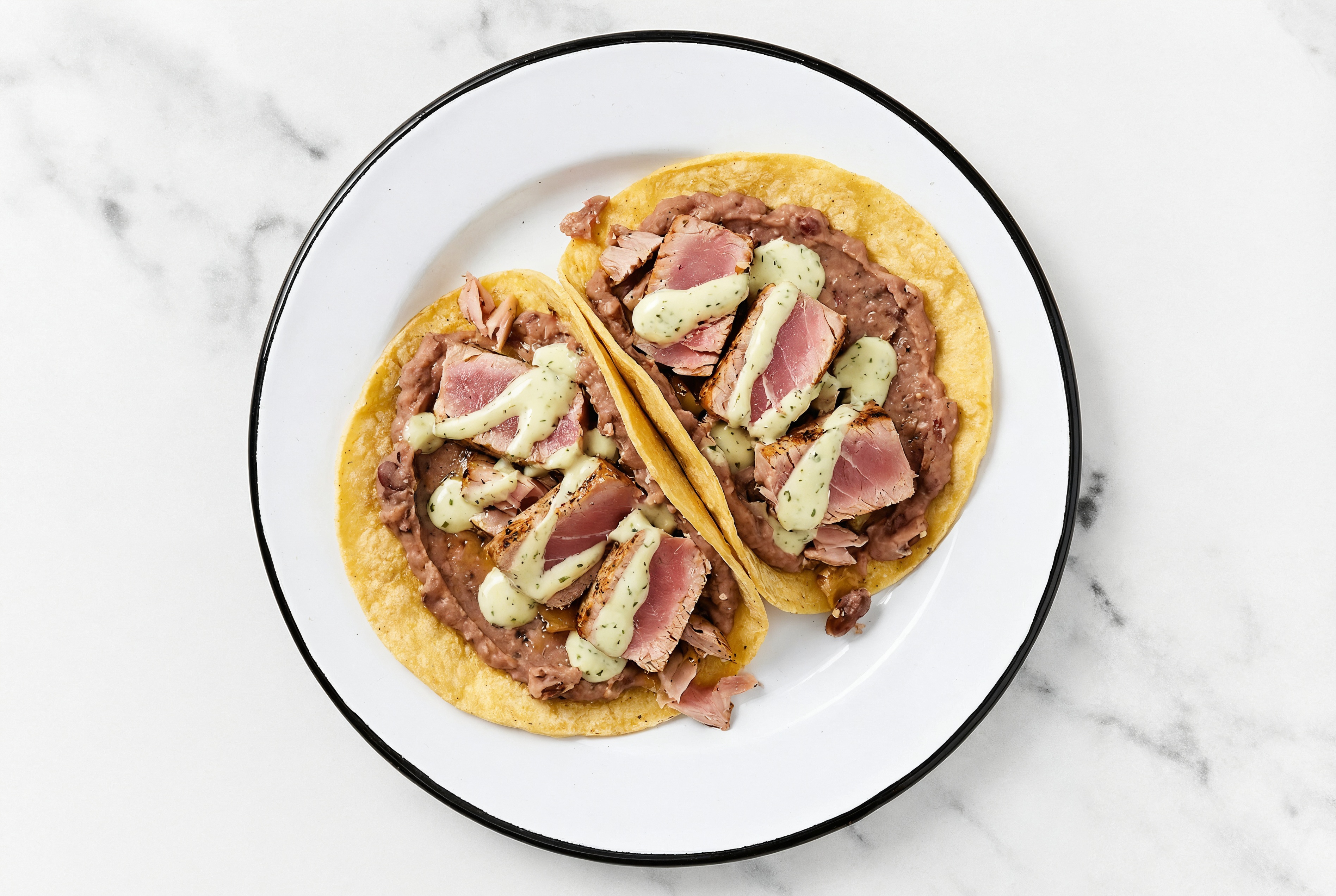 Herby Refried Red Bean Tacos with Seared Tuna & Jalapeño Crema