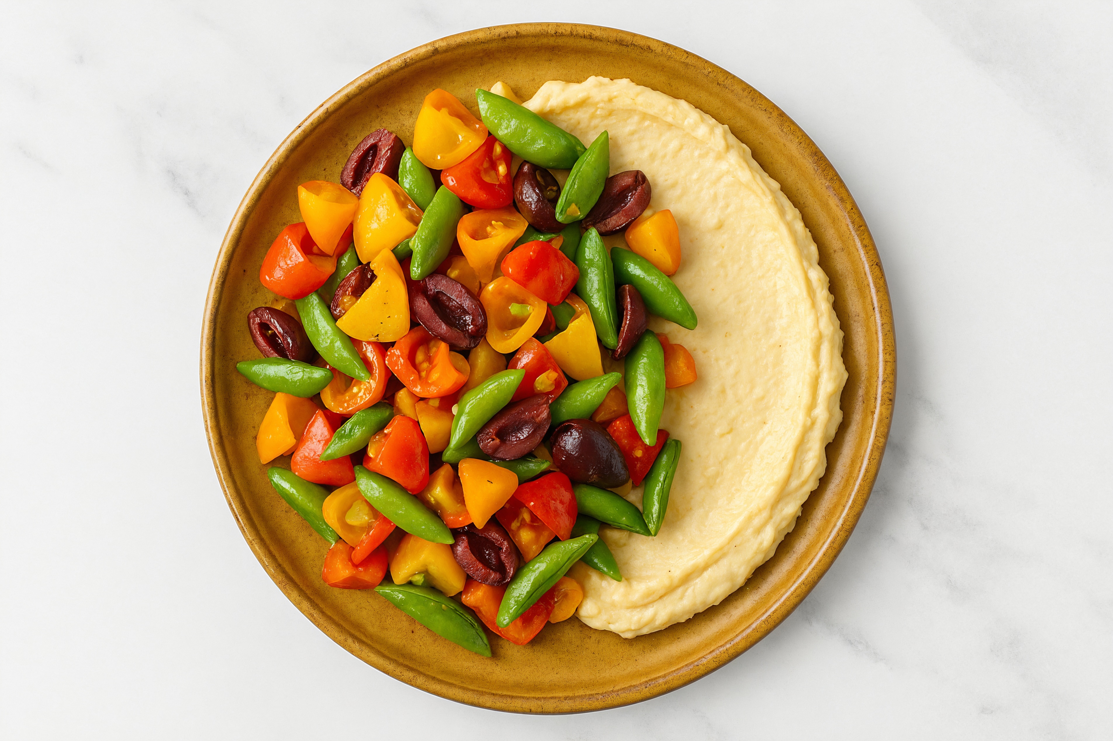 Olive Sweet Pepper Snap Pea Bowl over Lemon Garlic Hummus