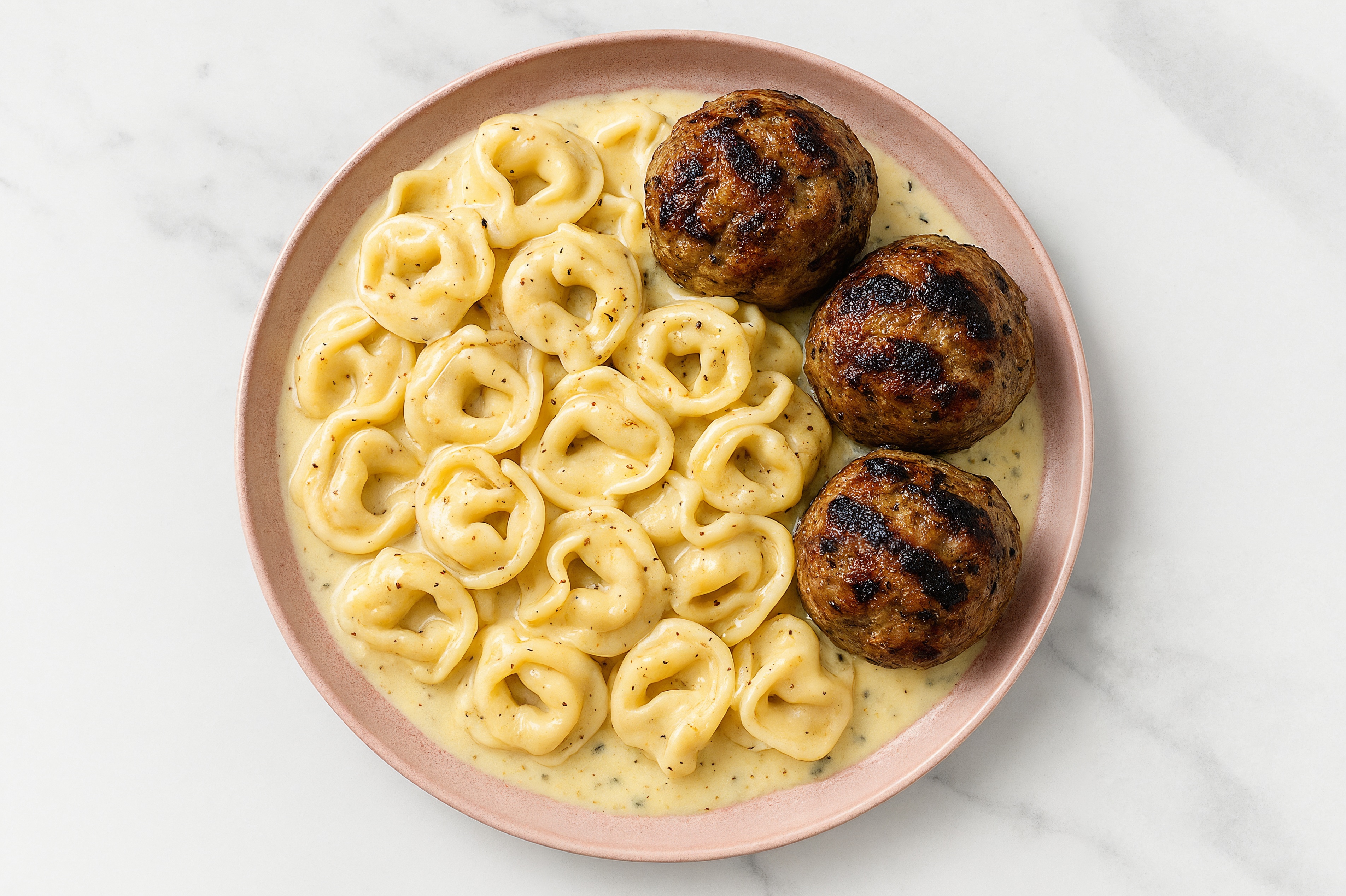 Herb Cream Tortelloni with Meatballs