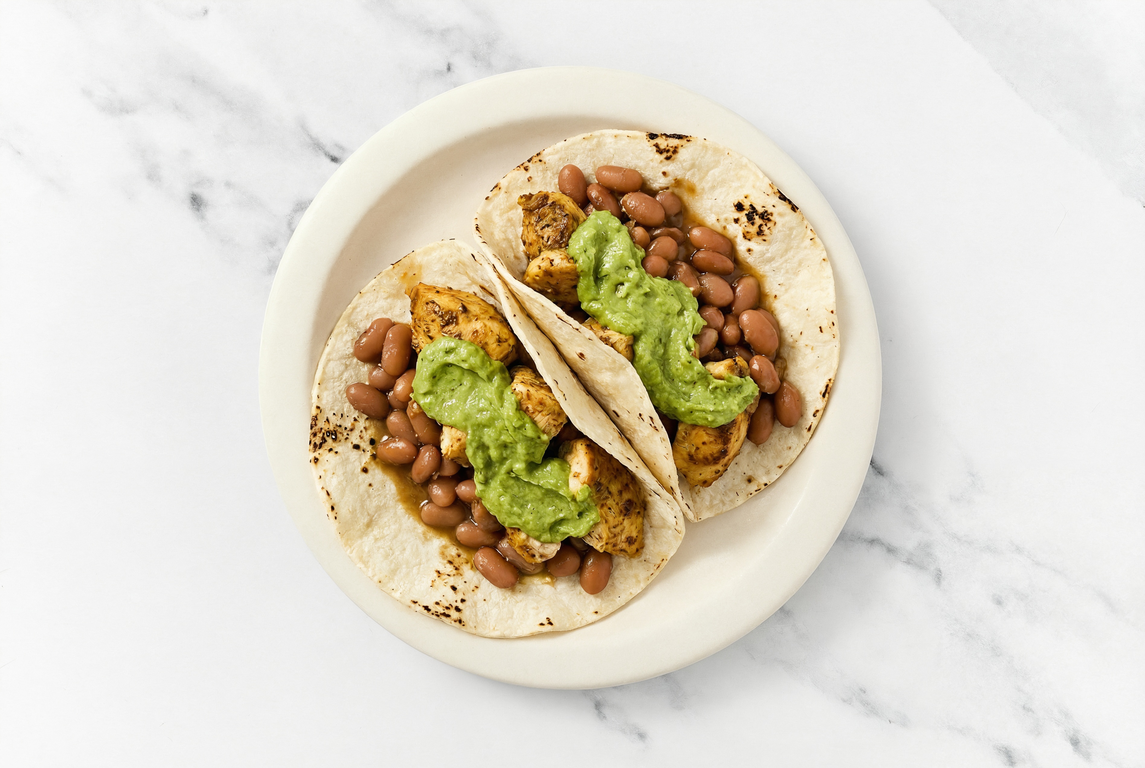 Hearty Garlic Chicken Tacos with Avocado & Pinto Beans