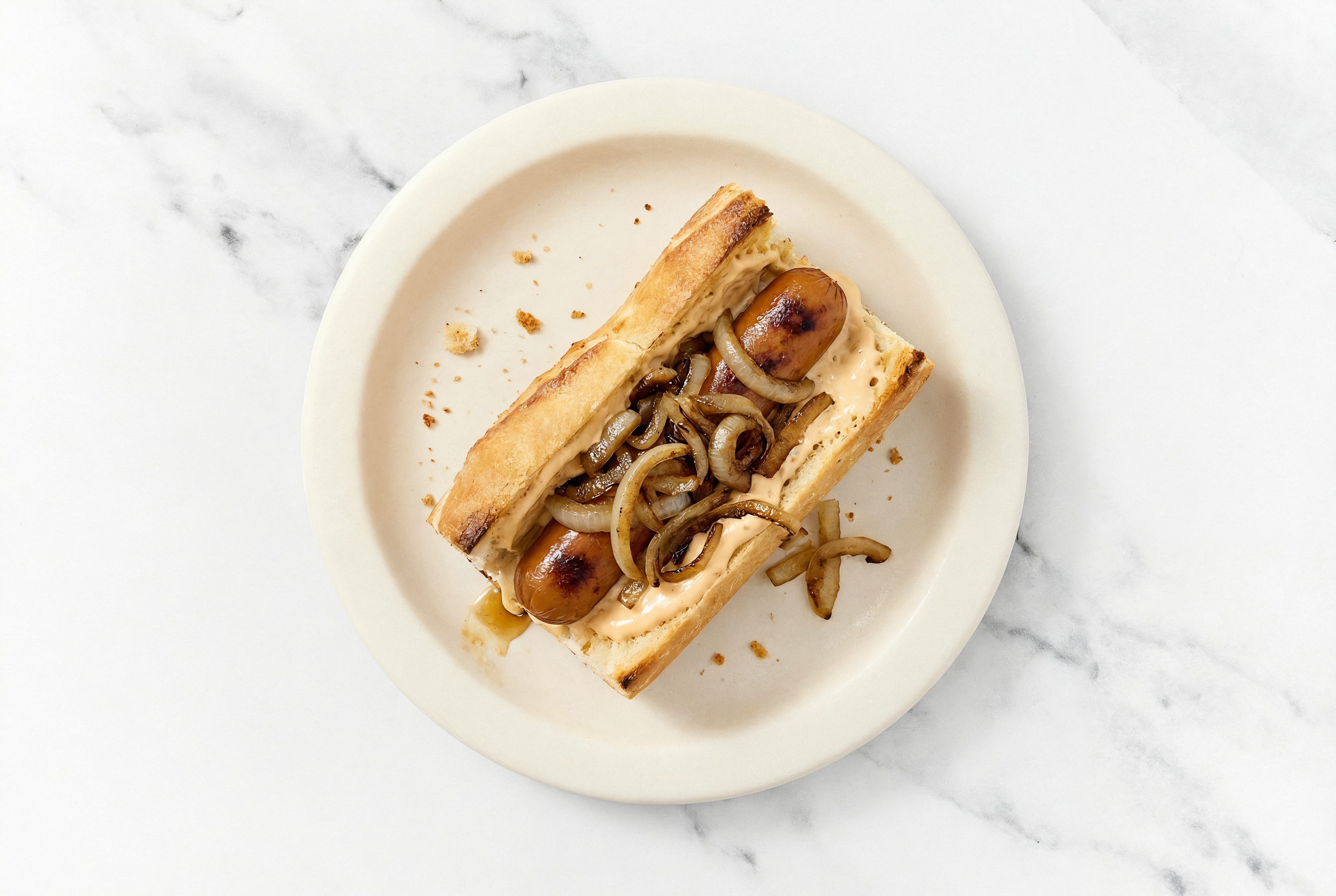 Carmelized Onion Smart Dog with Awesome Sauce on Baguette