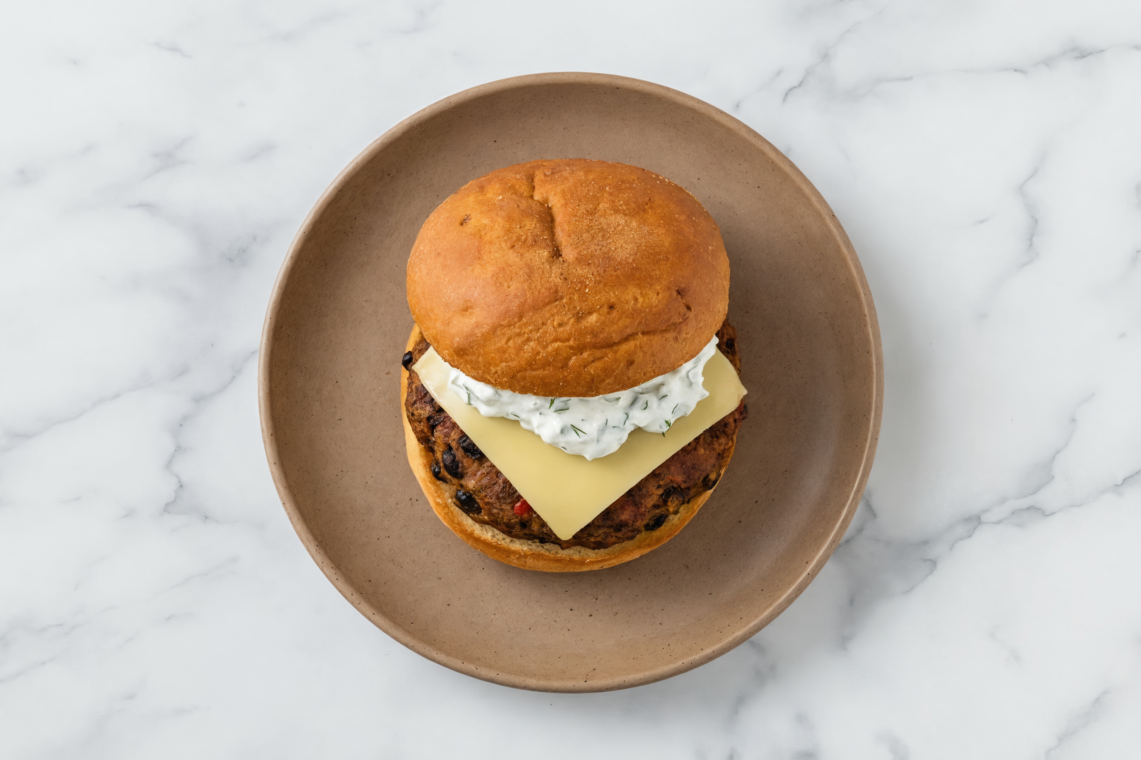 Havarti Black Bean Burger on GF Bun with Cucumber Tzatziki