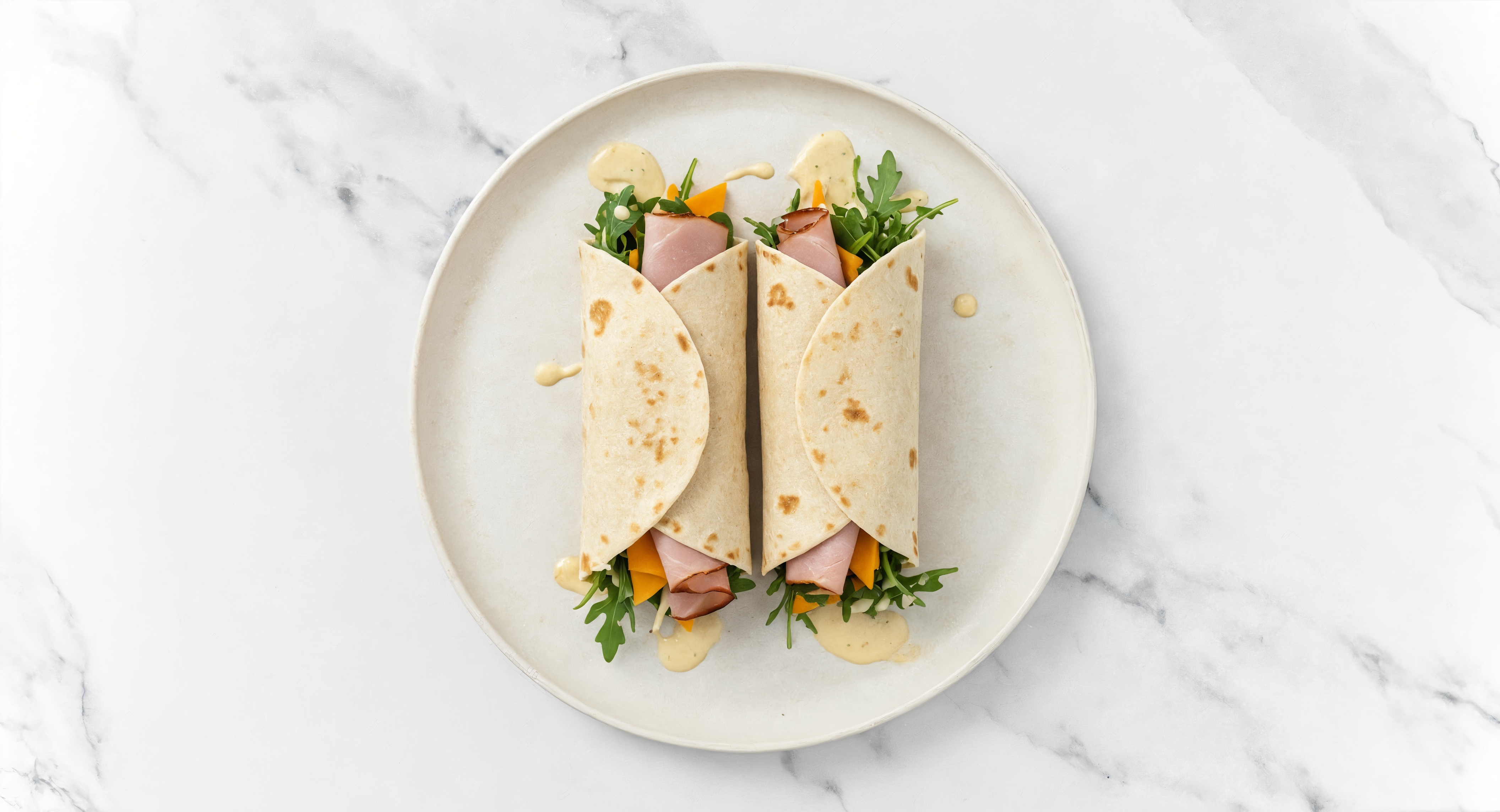 Garlic Honey Ham + Cheddar Tortilla Wraps with Arugula