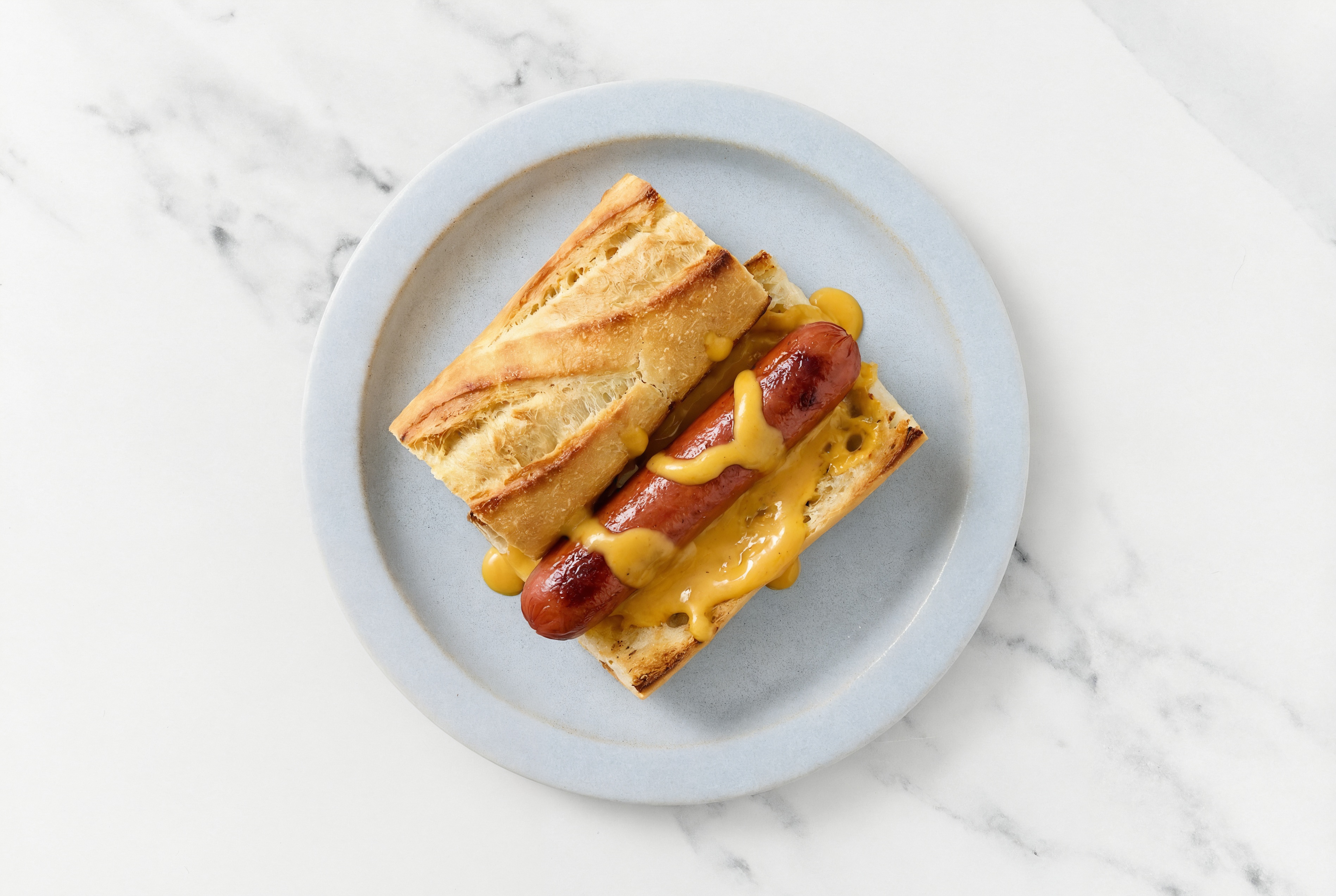 Beef Hot Dog with Super Special Sauce on Baguette