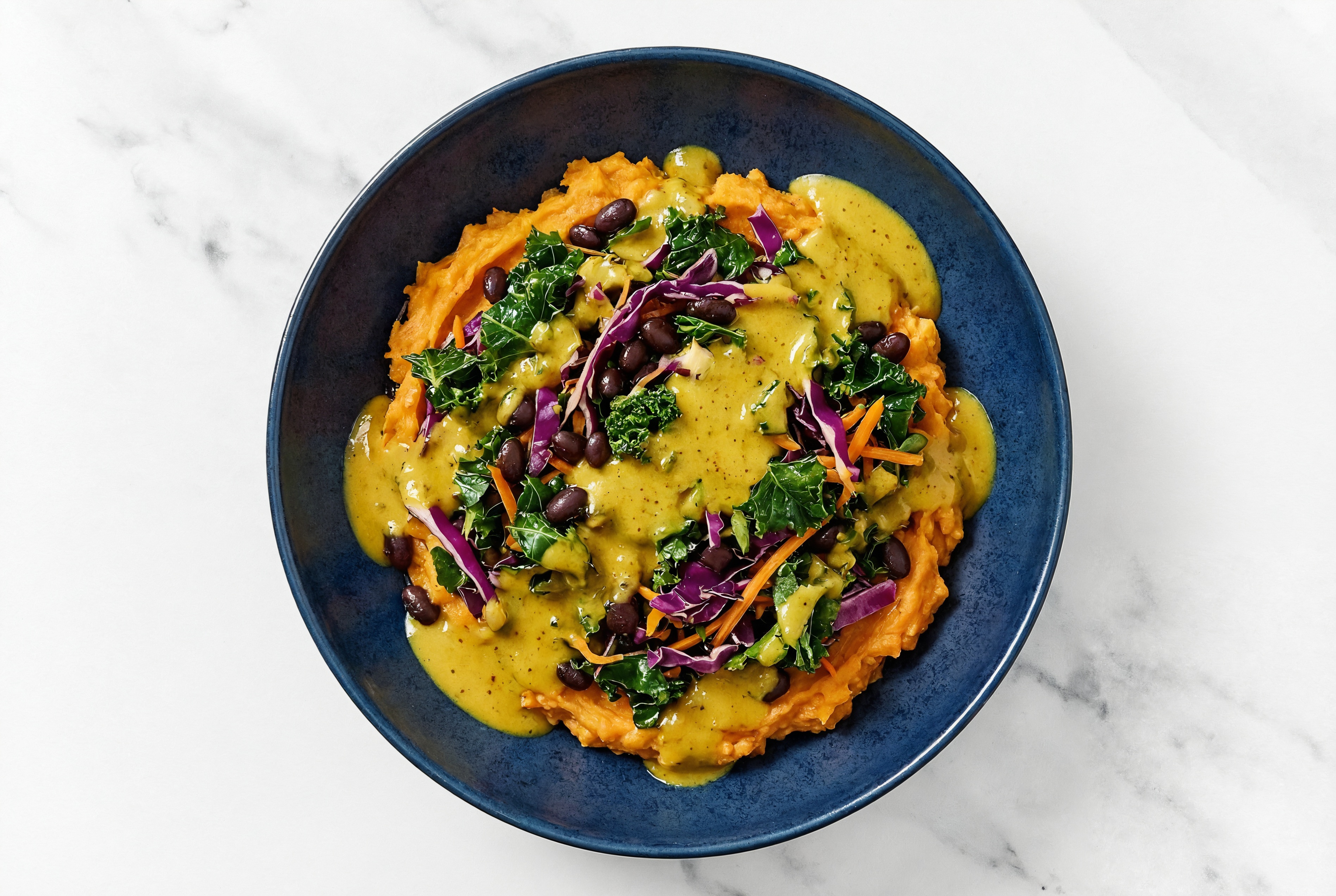 Coconut Curry Black Bean Beans + Kale Mix over Mashed Sweet Potato