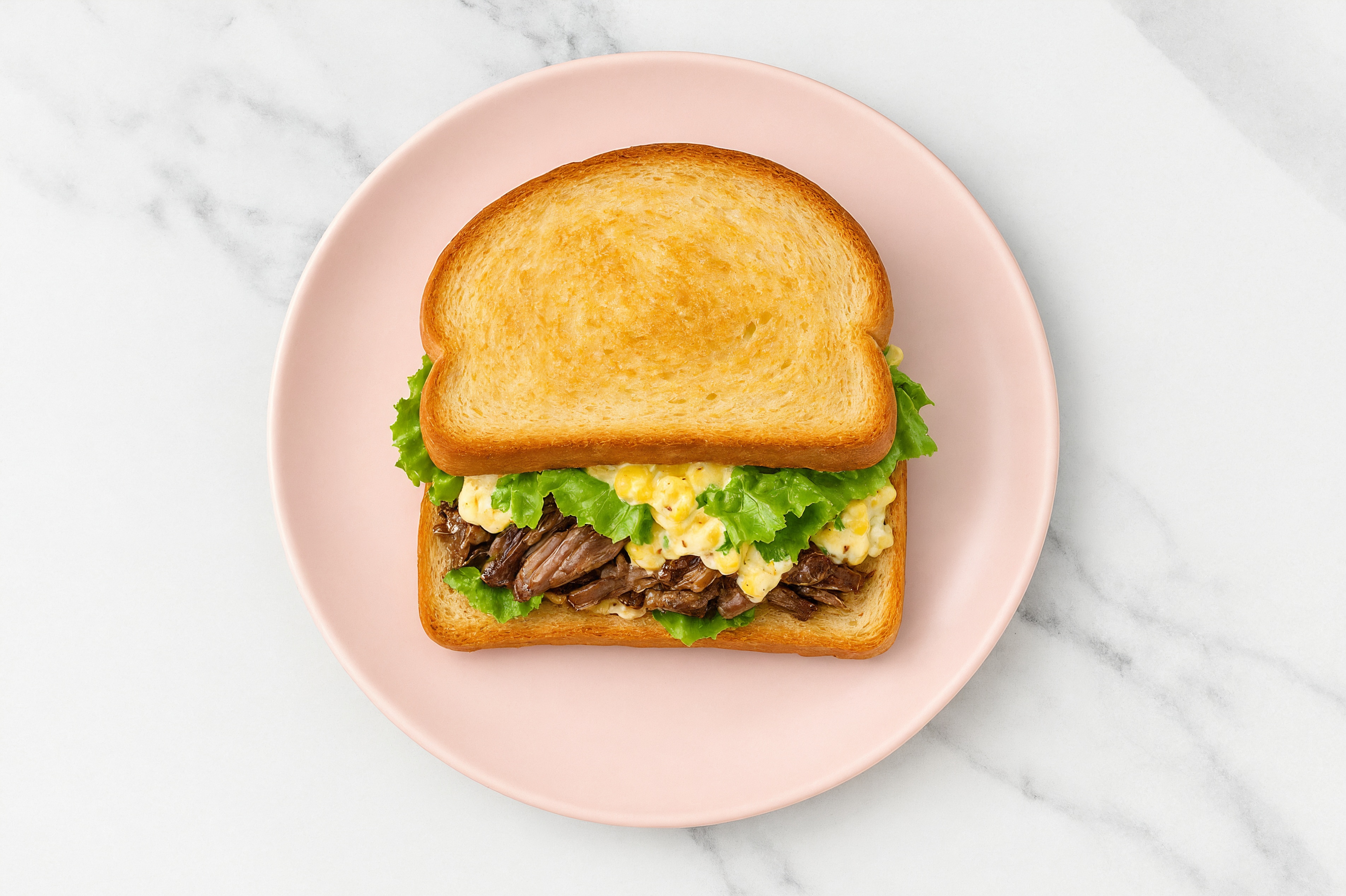 Street Corn Beef Short Rib Sandwich with Green Leaf Lettuce on Honey White Bread