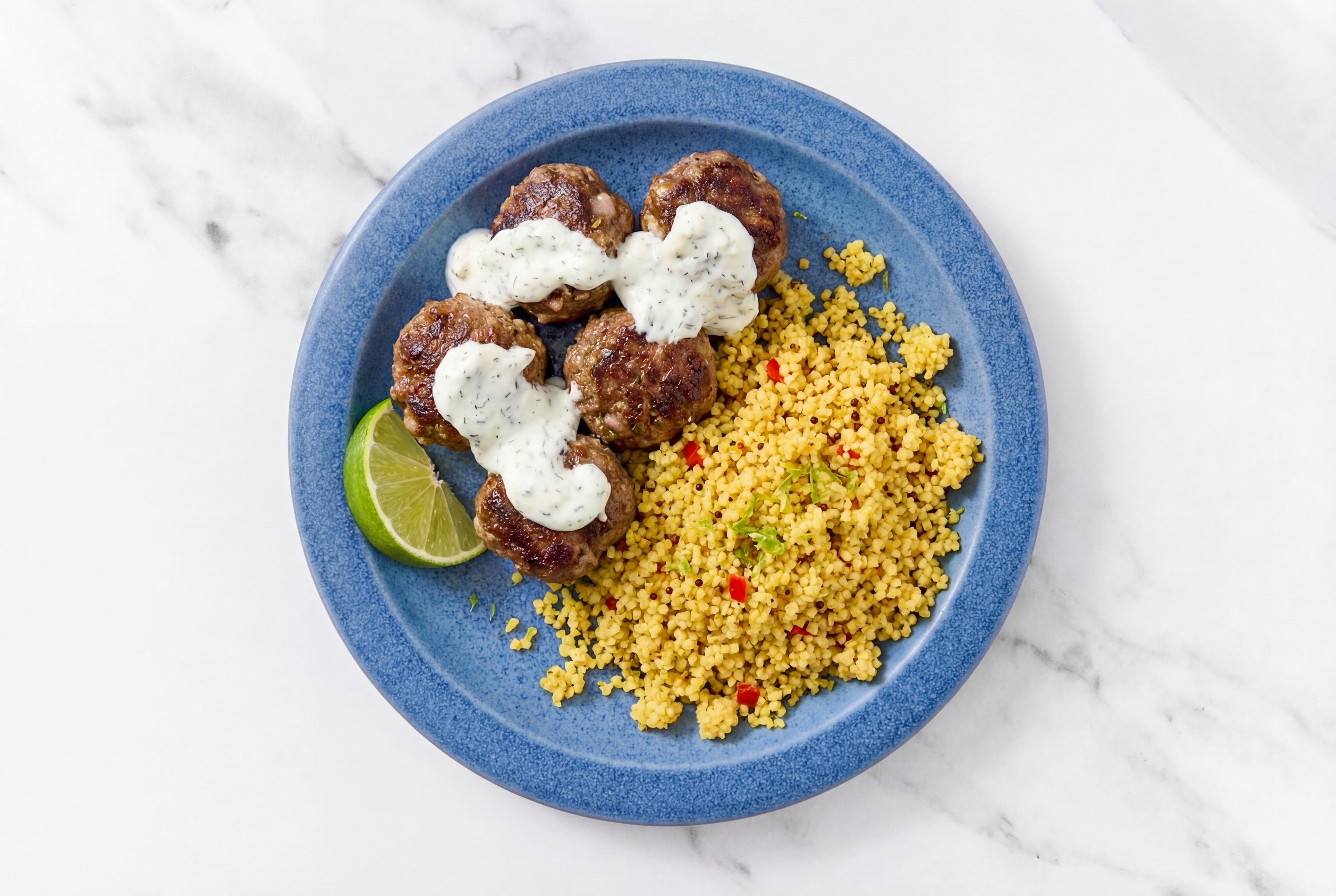 Italian-Style Ground Beef Za'atar Meatballs + Lime Couscous