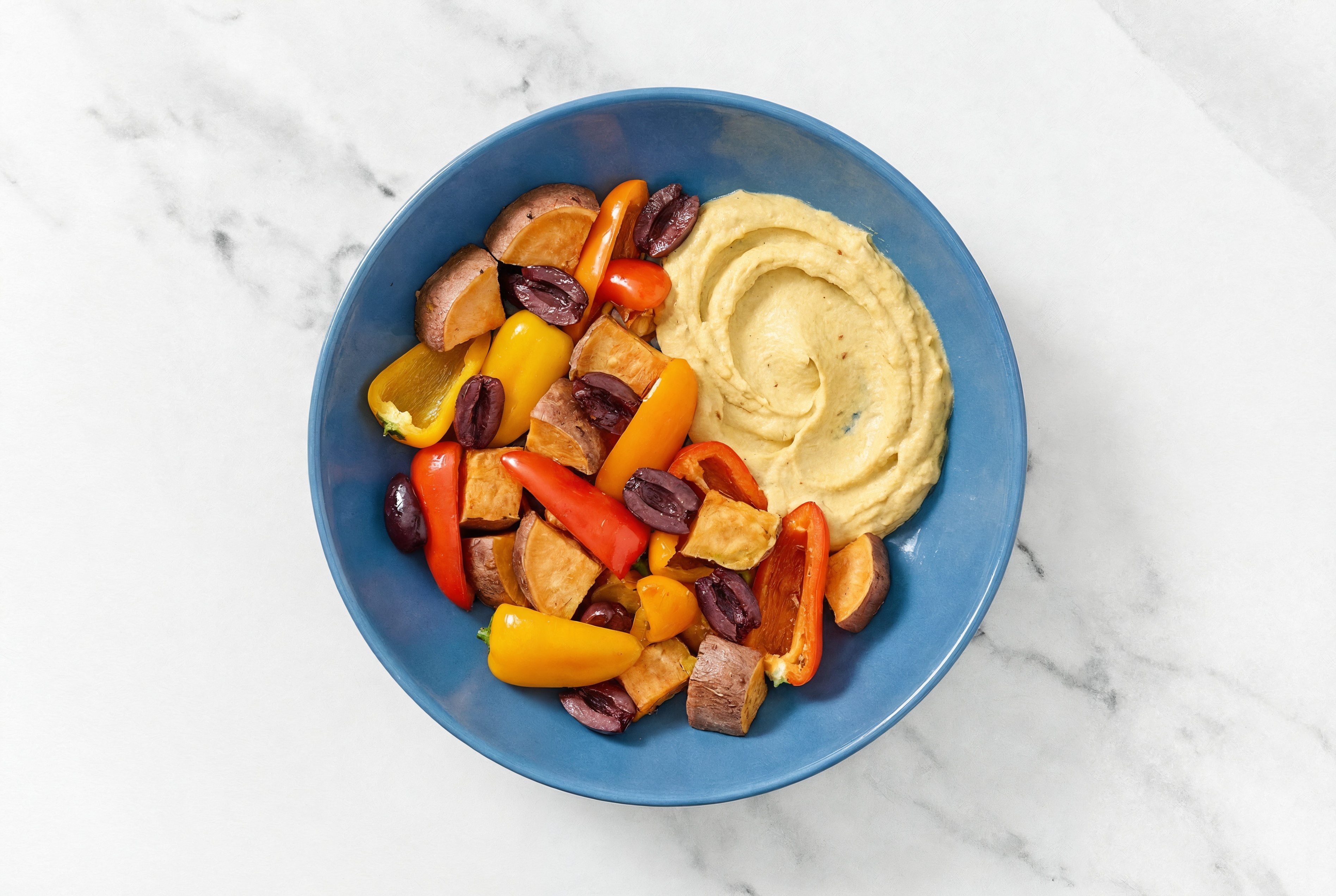 Olive Sweet Pepper Sweet Potato Bowl over Onion Hummus