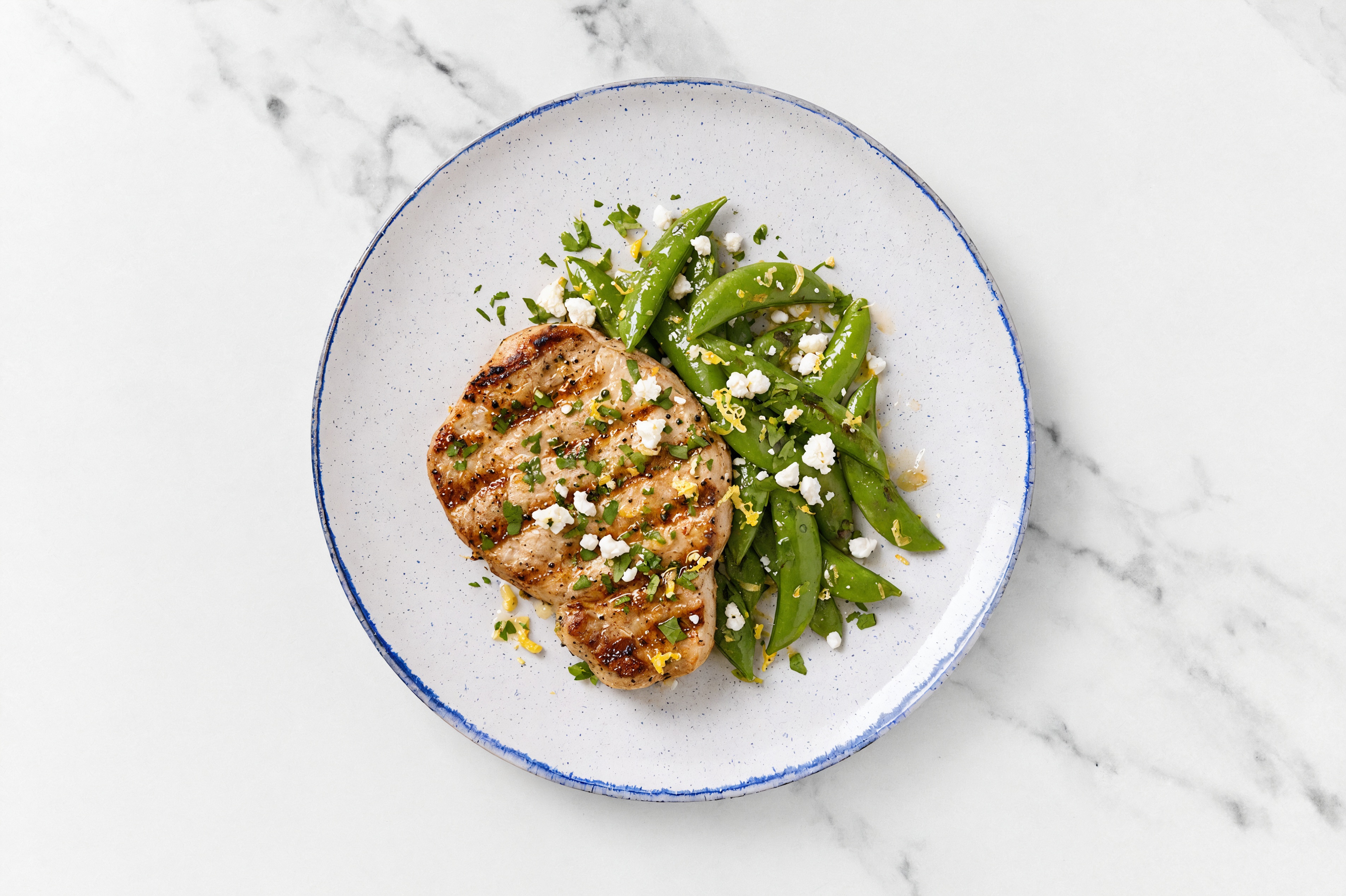 One-Skillet Lemony Pork Chops + Pea Snaps