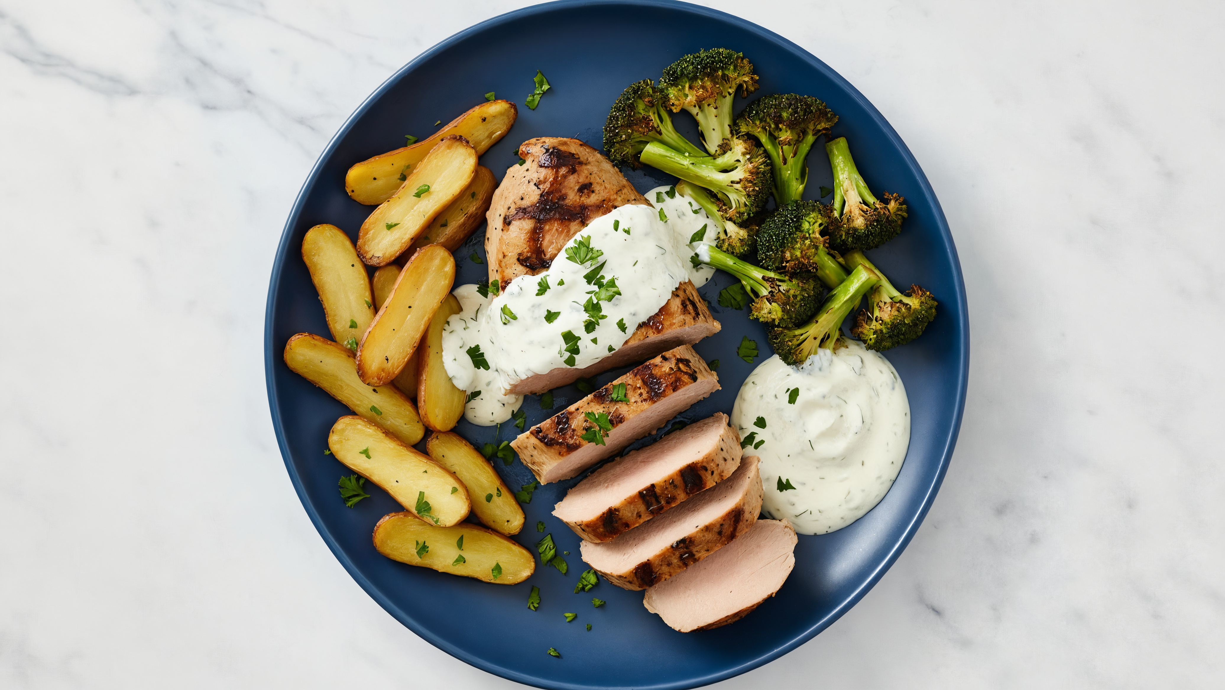 Herby Sheet-Pan Pork Tenderloin + Veggies with Tzatziki with Broccoli Florets