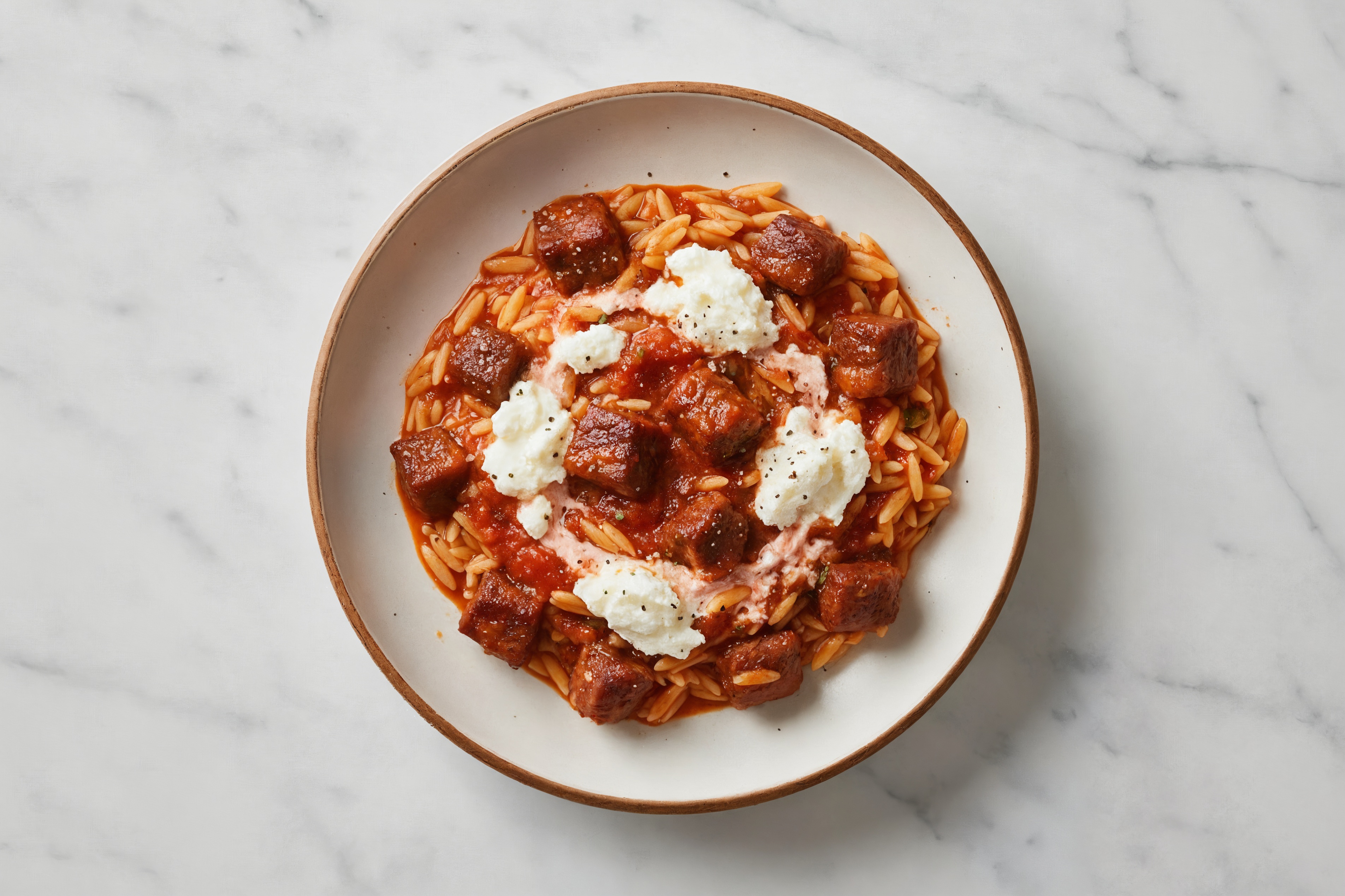 Hearty Tomato Marinara Orzo with Bison & Ricotta | Hungryroot