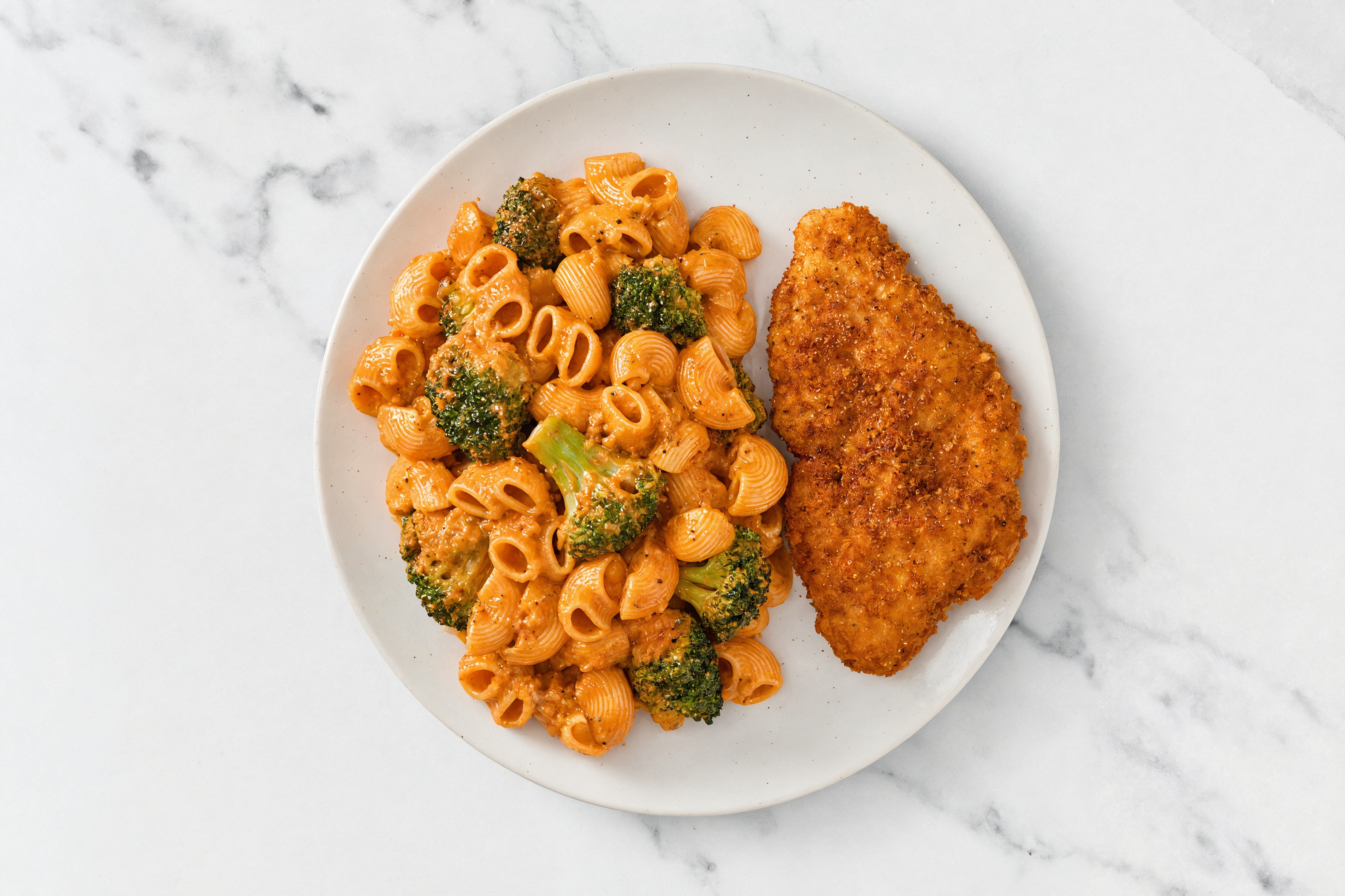 Crispy Hot Honey Chicken over Creamy Vodka Chiocciole Pasta with Broccoli