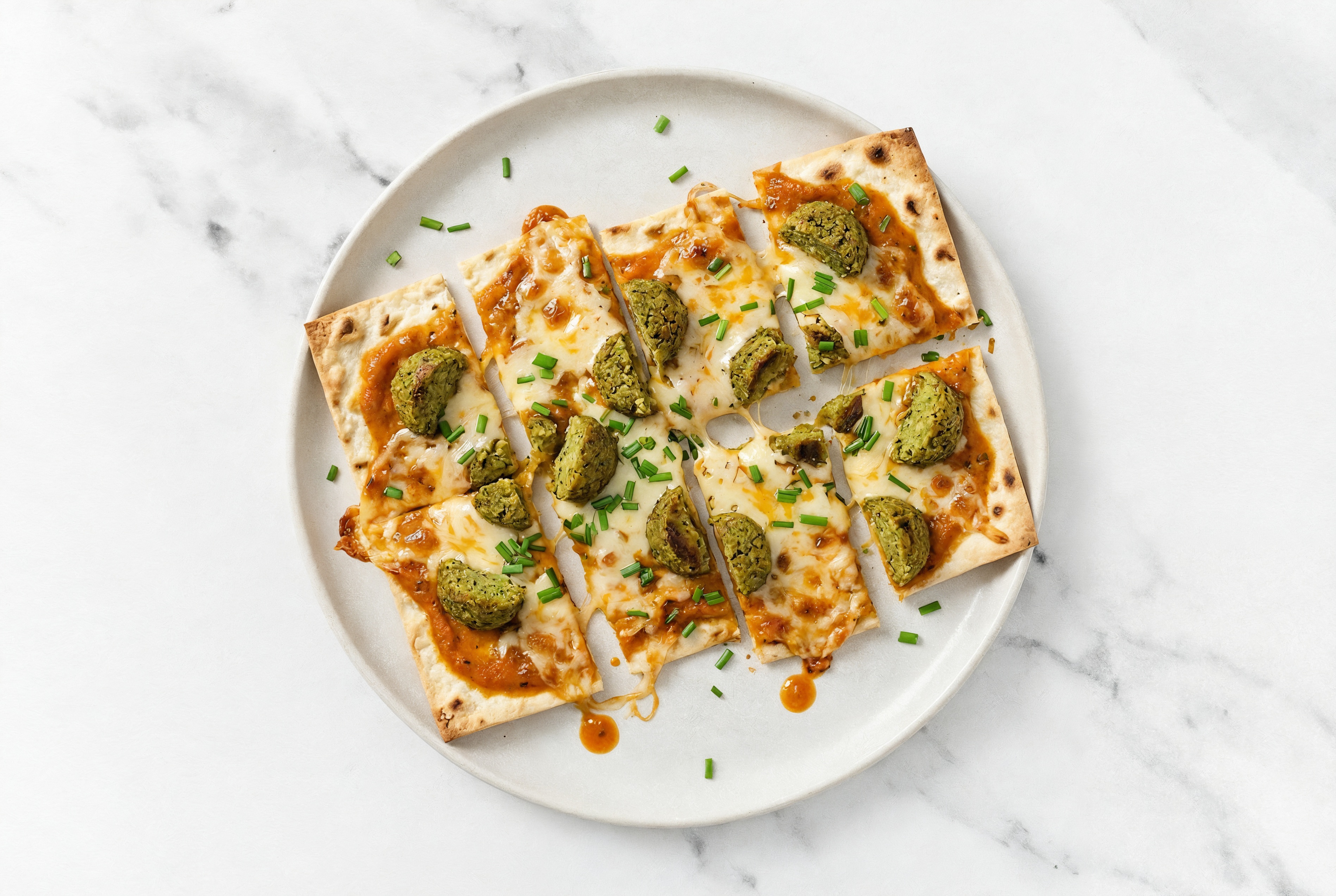 Spiced Tikka  Falafel Lavash Pizza with Mild Havarti + Fresh Chives