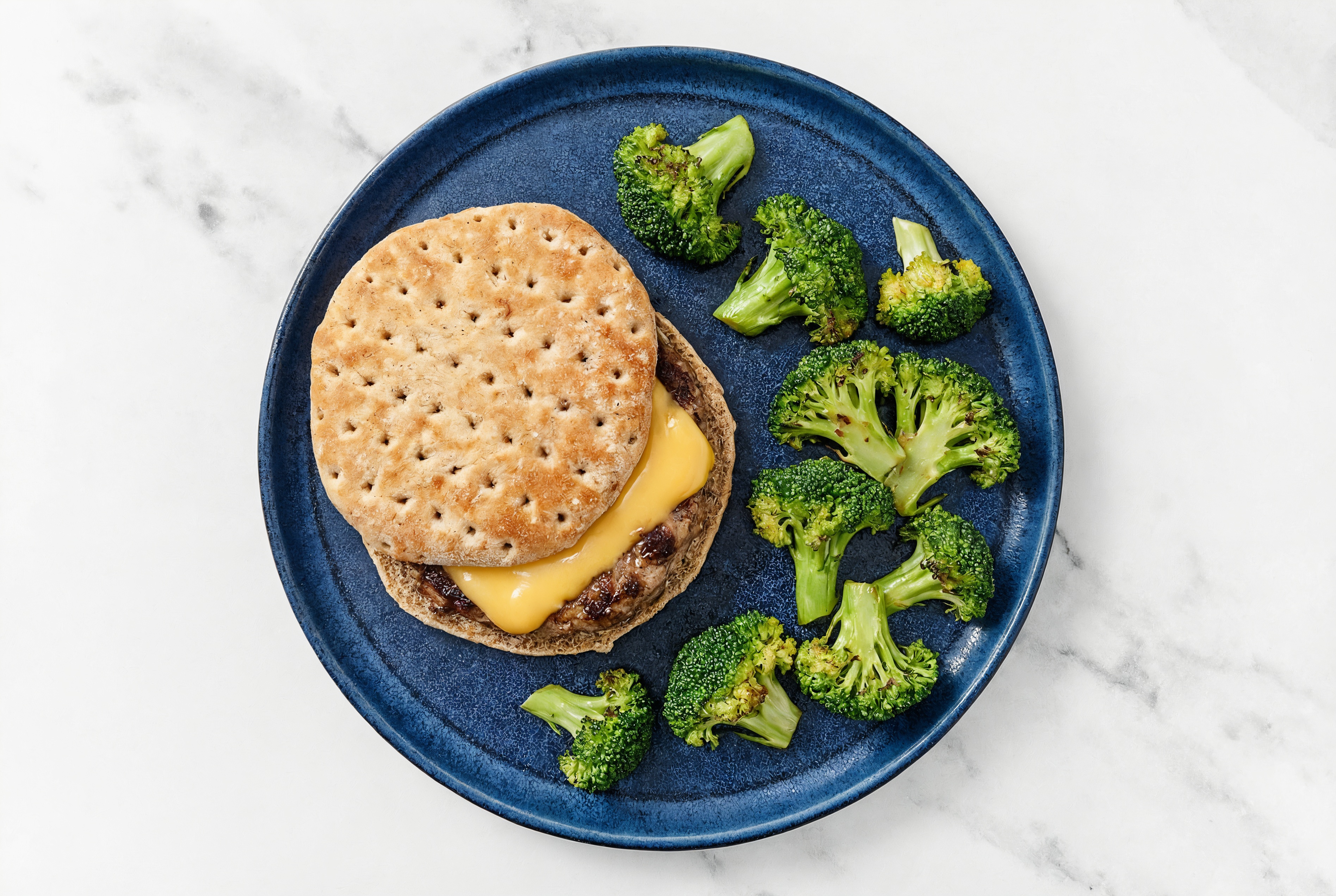 Classic Cheesy Veggie Burger on Multigrain Bun with Ground Beef Patties