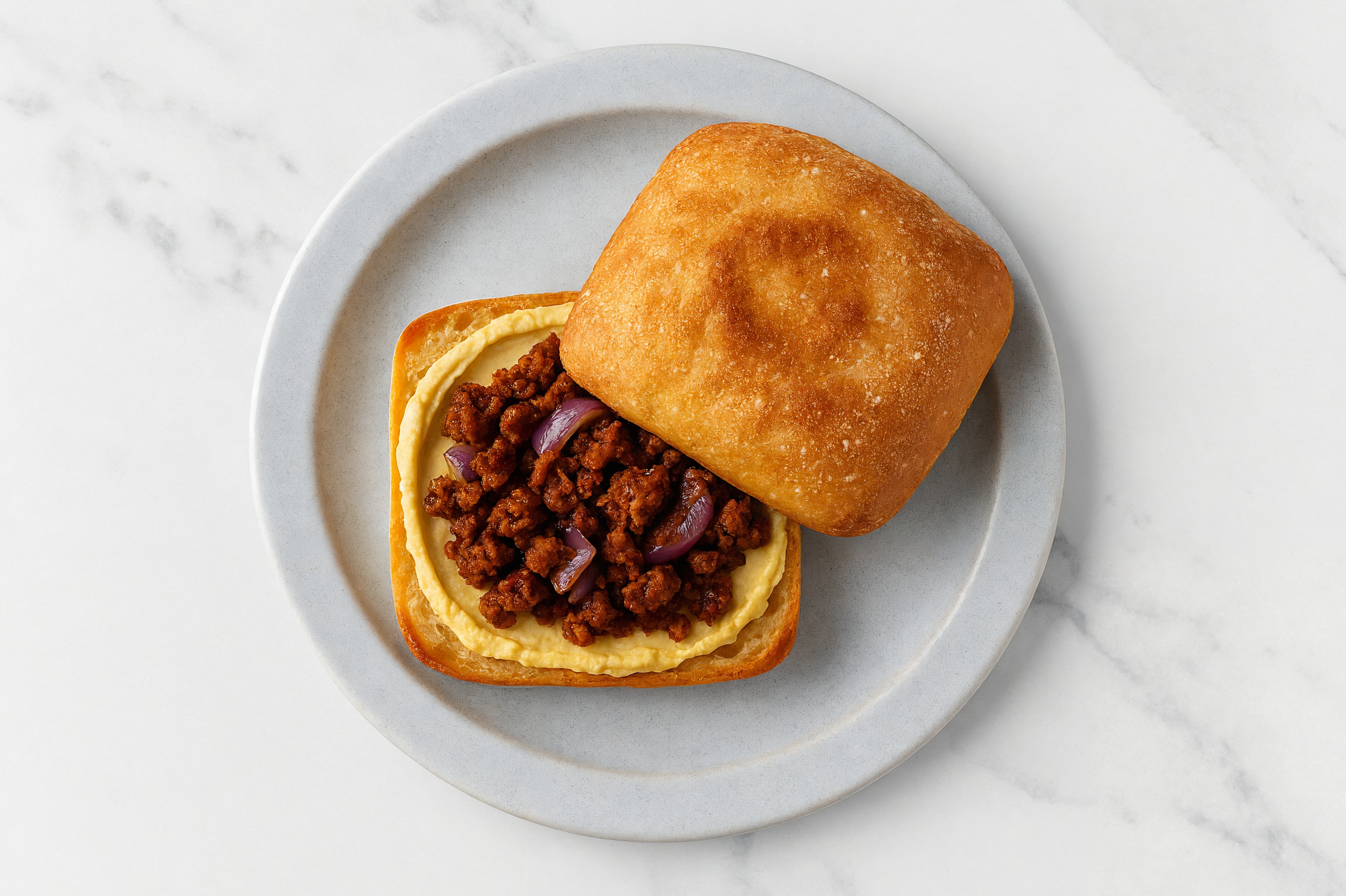 Grilled Olive Oil Sea Salt Hummus Toast with "Chorizo"