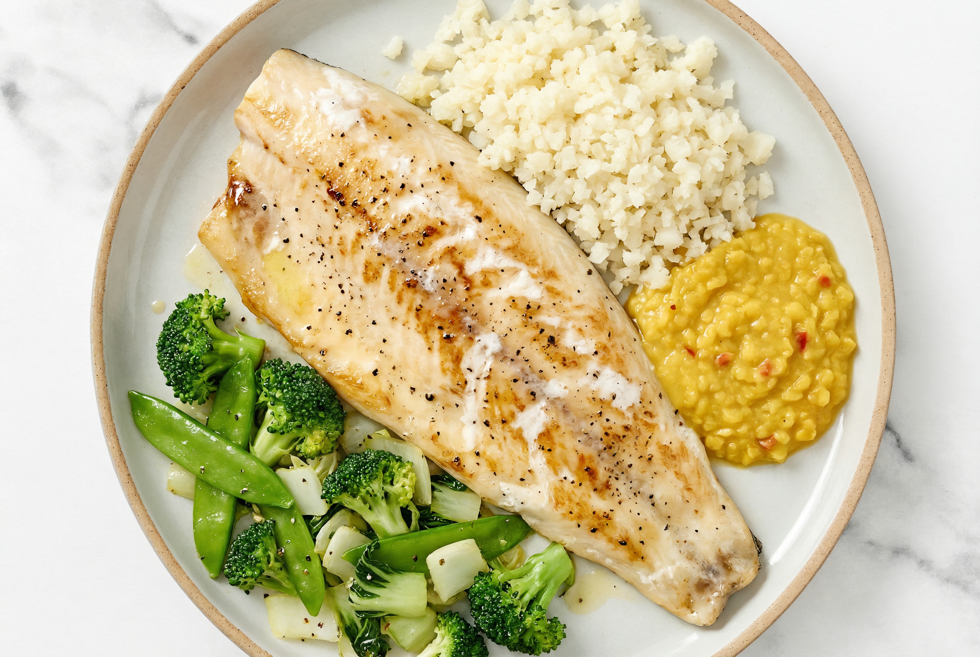 Seared Trout + Bok Choy Red Lentil Bowl with Riced Cauliflower