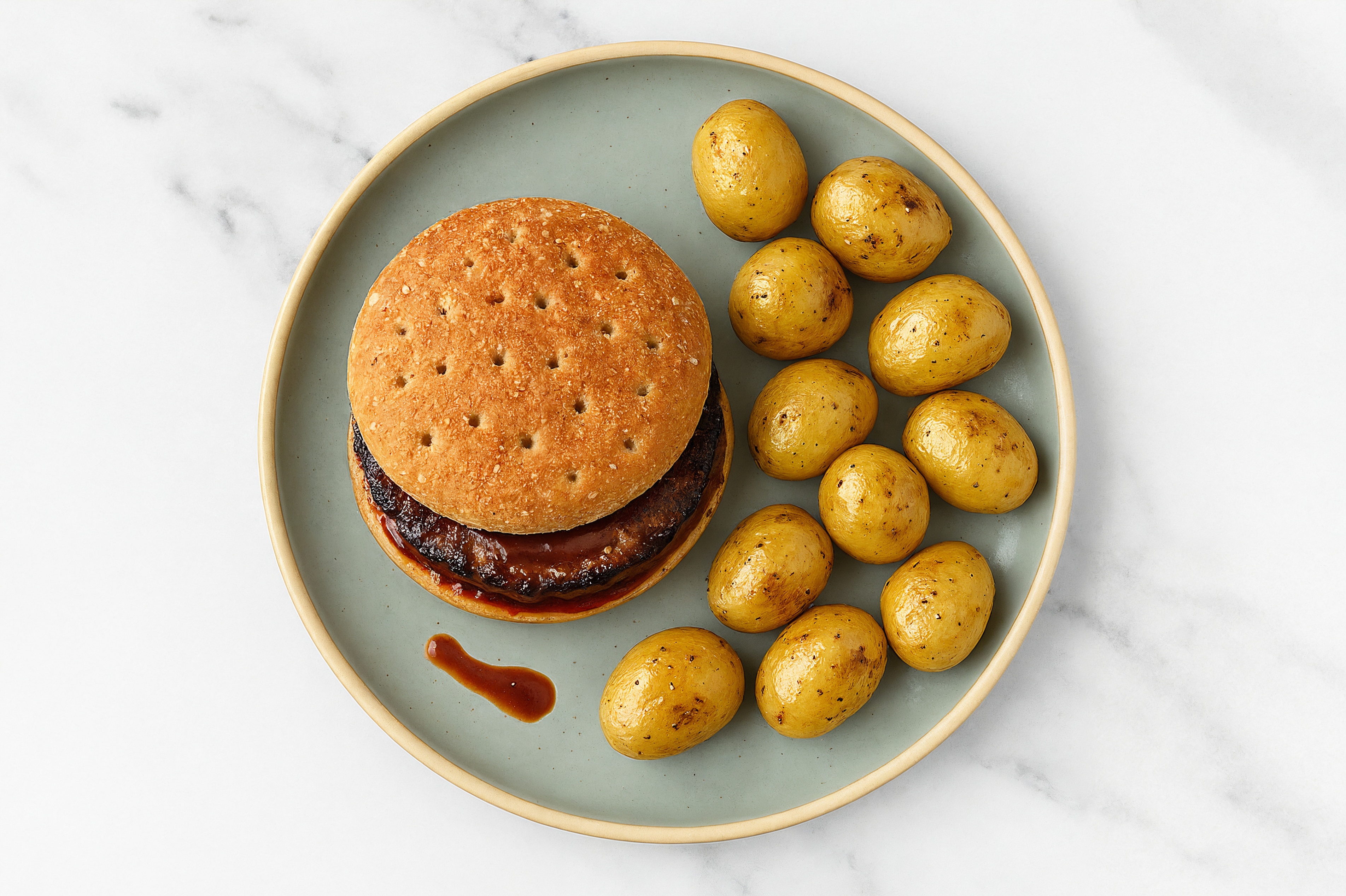 Herby BBQ Bacon + Cheddar Burger with Yellow Potatoes
