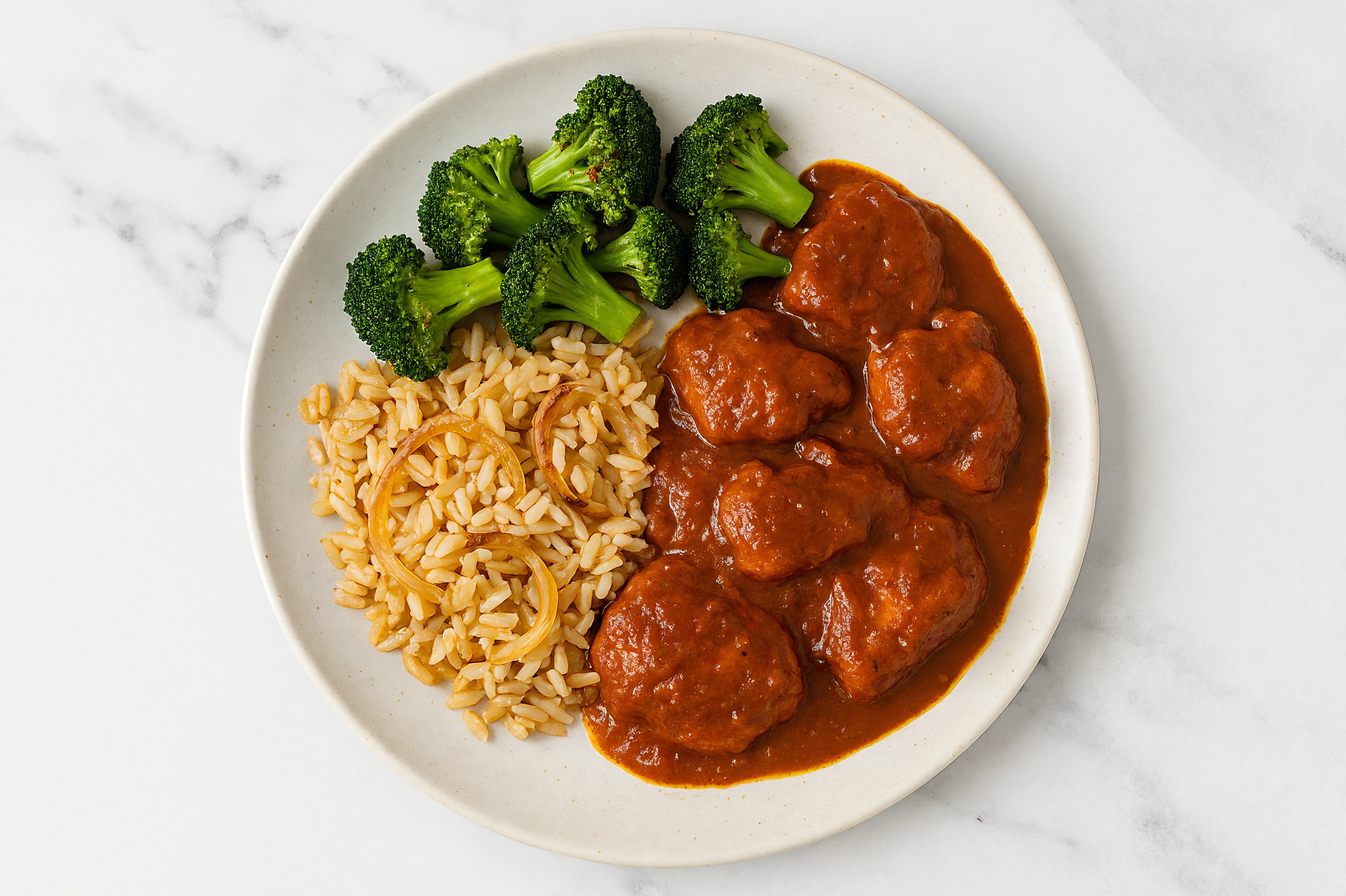 Stove-Top Chicken Vindaloo + Caramelized Onion Rice Pilaf with Broccoli Florets