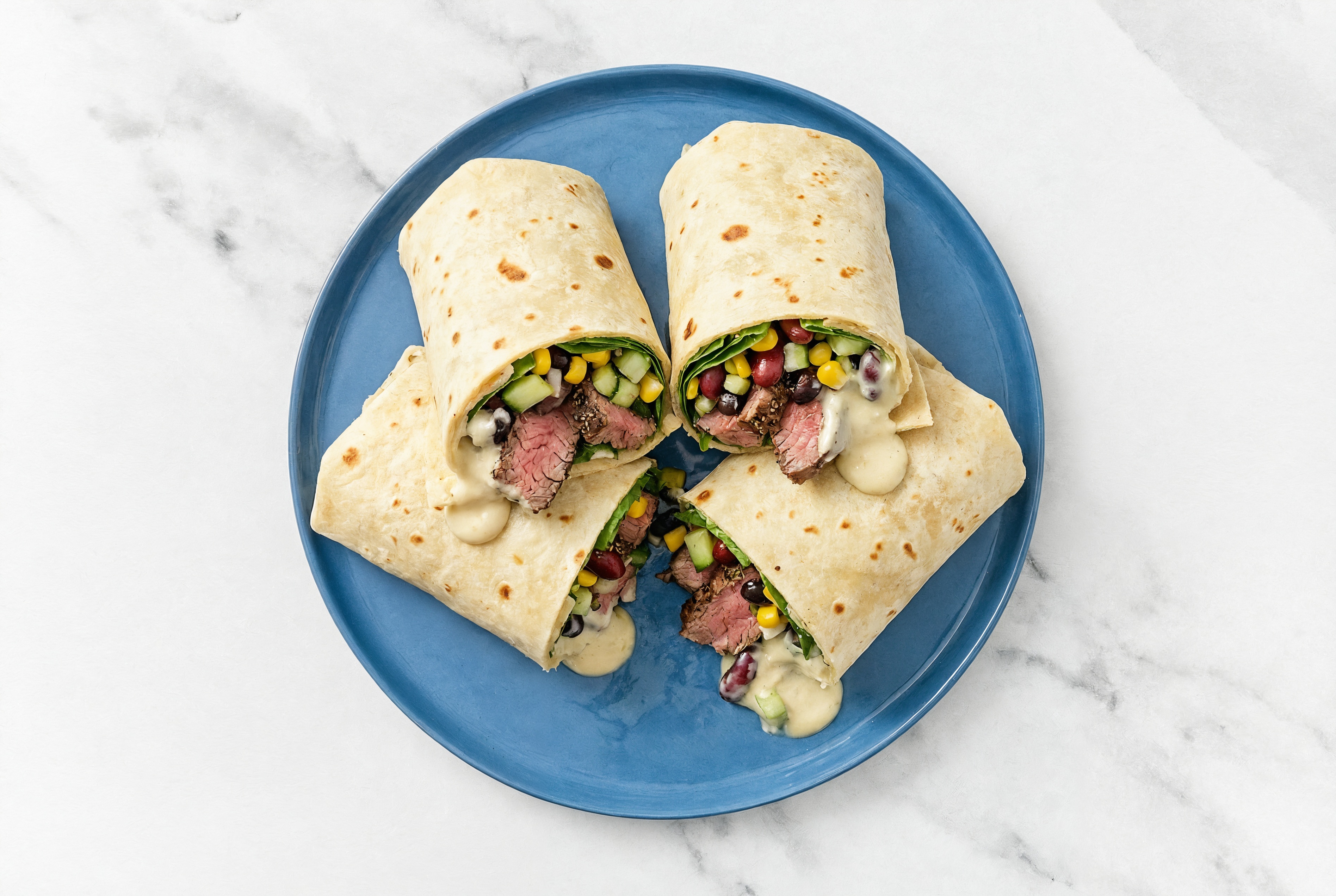 Garlic Sliced Steak + Cucumber Tortilla Wraps with Spinach