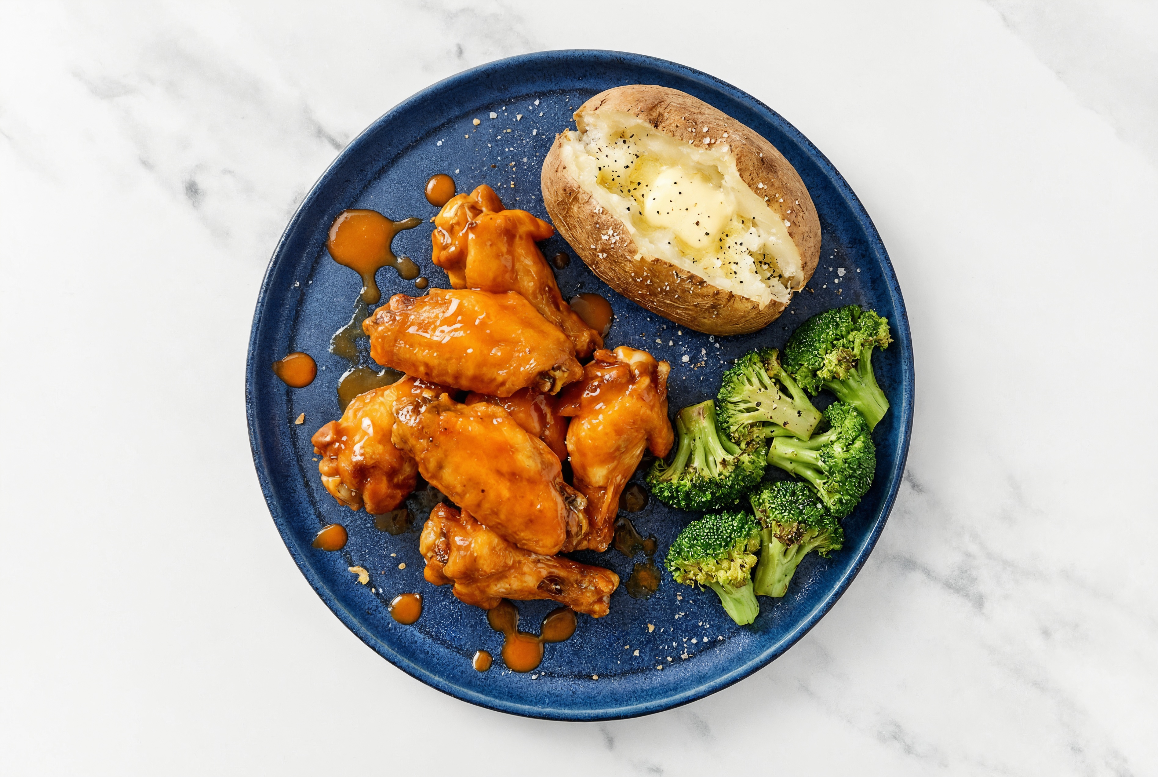 Buffalo Chicken Wings with Baked Potato + Broccoli Florets
