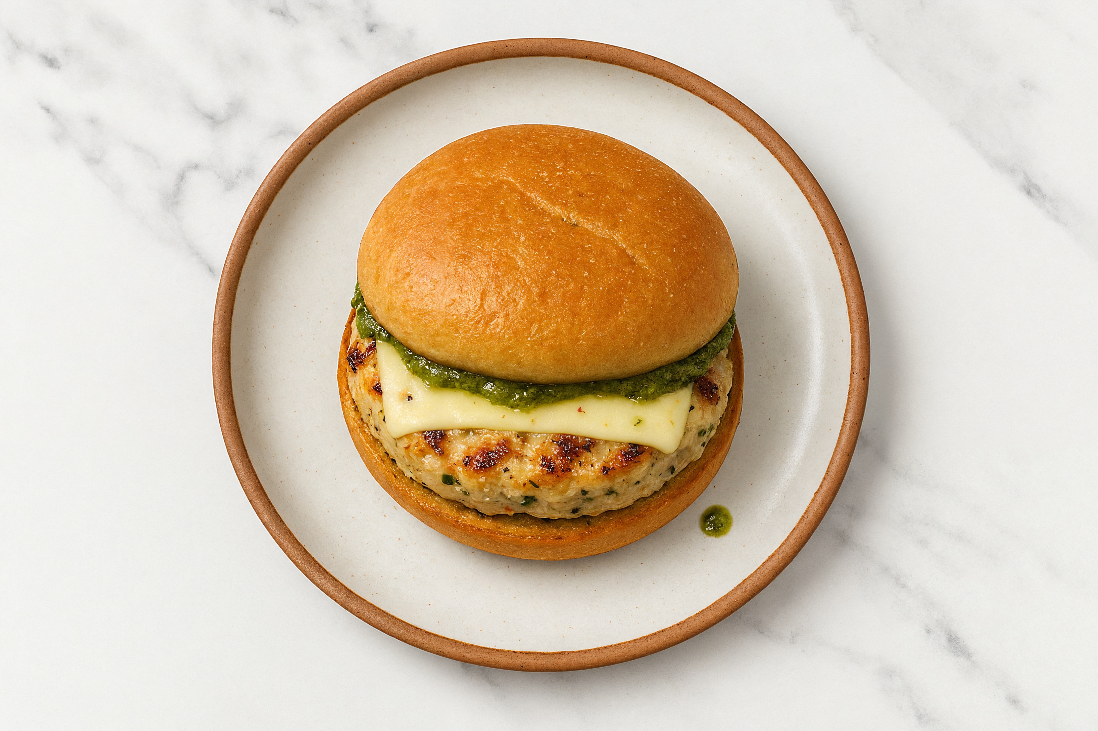 Garlic Chicken Burger on Gluten-Free Bun with Pesto & Pepper Jack