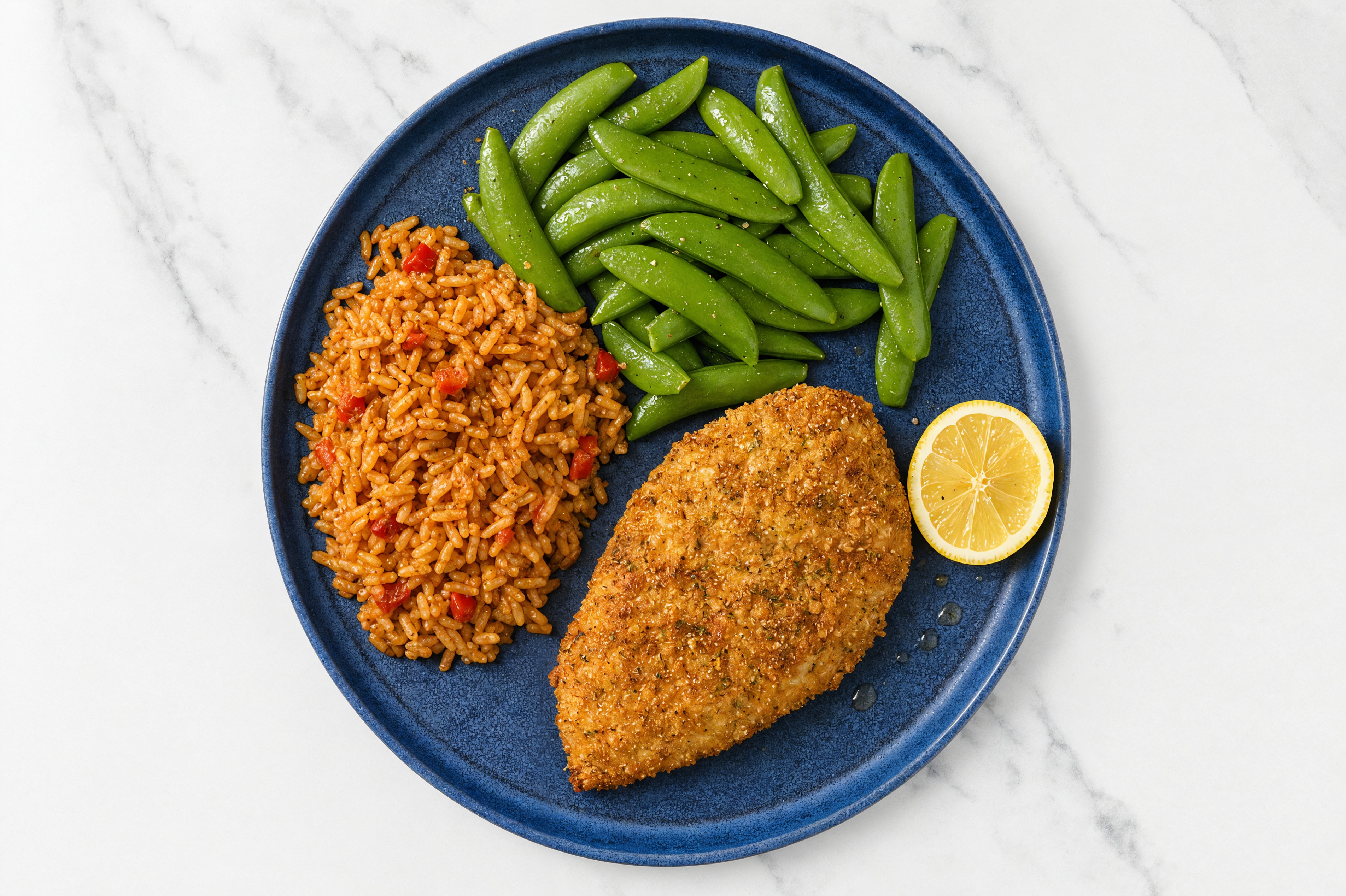 Lemon Parmesan Breaded Chicken Cutlet with Snap Peas & Mexican Rice
