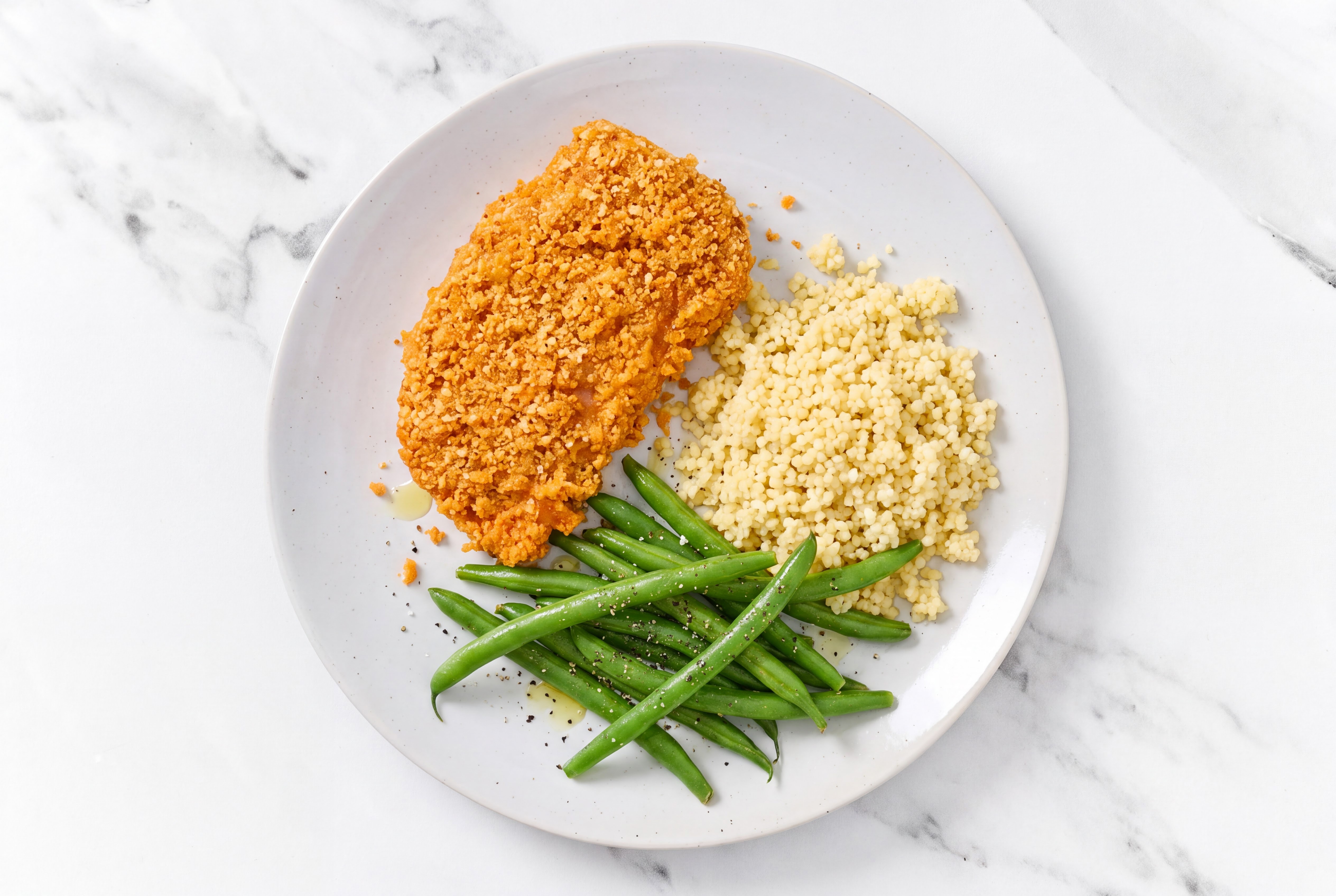 Hot Honey Breaded Chicken Cutlet with Organic Green Beans & Couscous