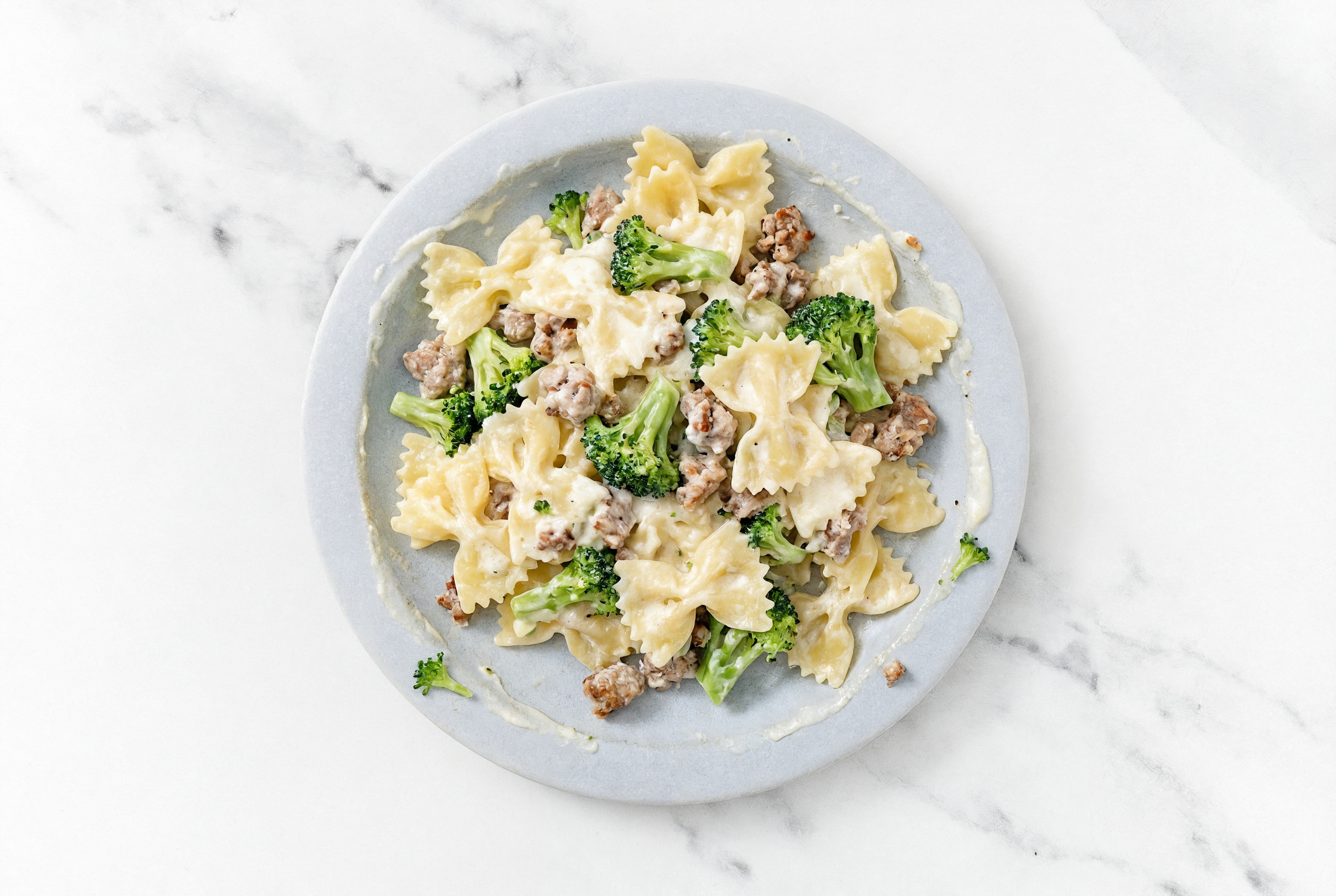 Creamy Sausage + Broccoli Bunches Ricotta Farfalle Pasta