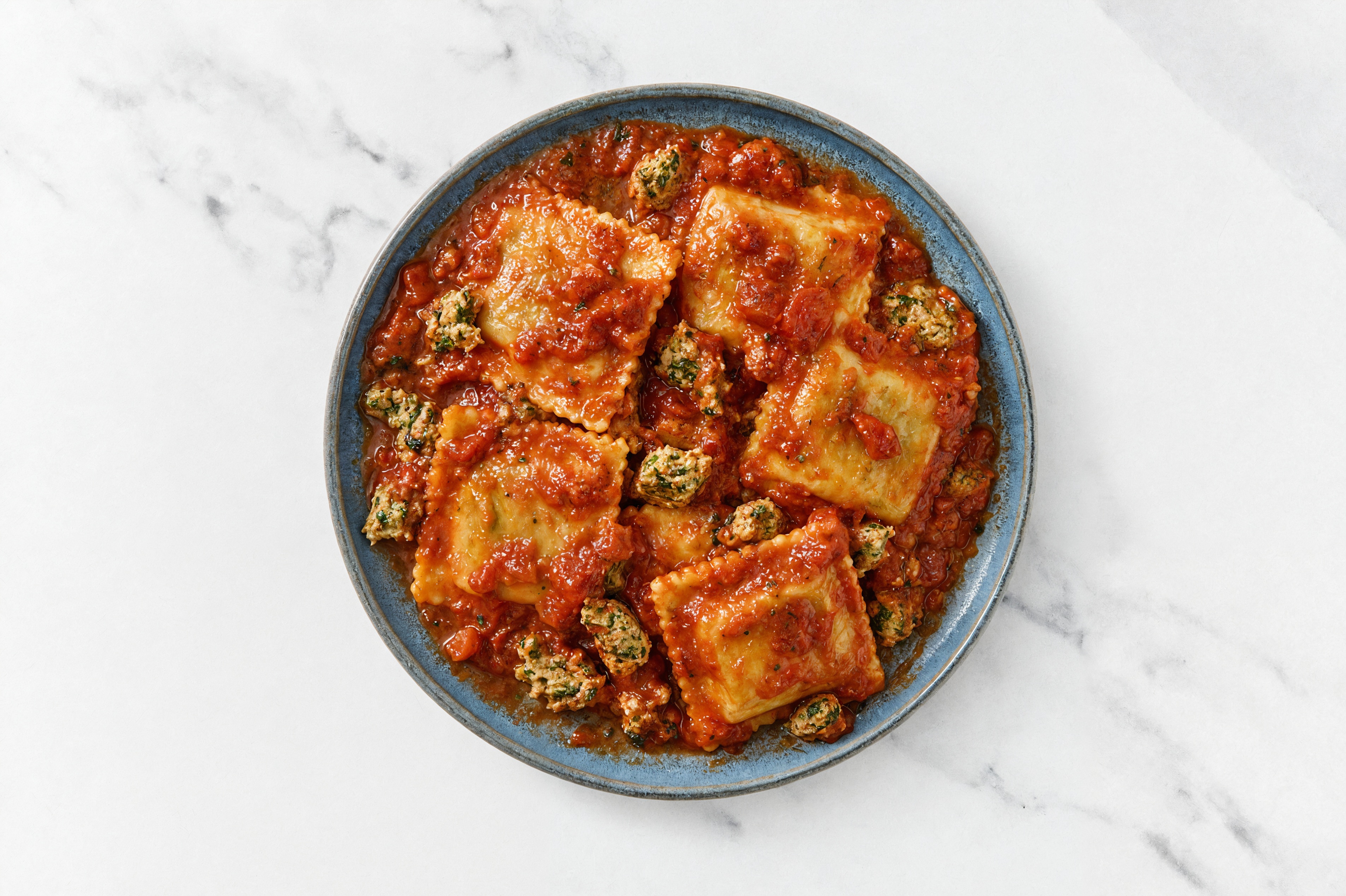 Savory Turkey Ravioli Bolognese