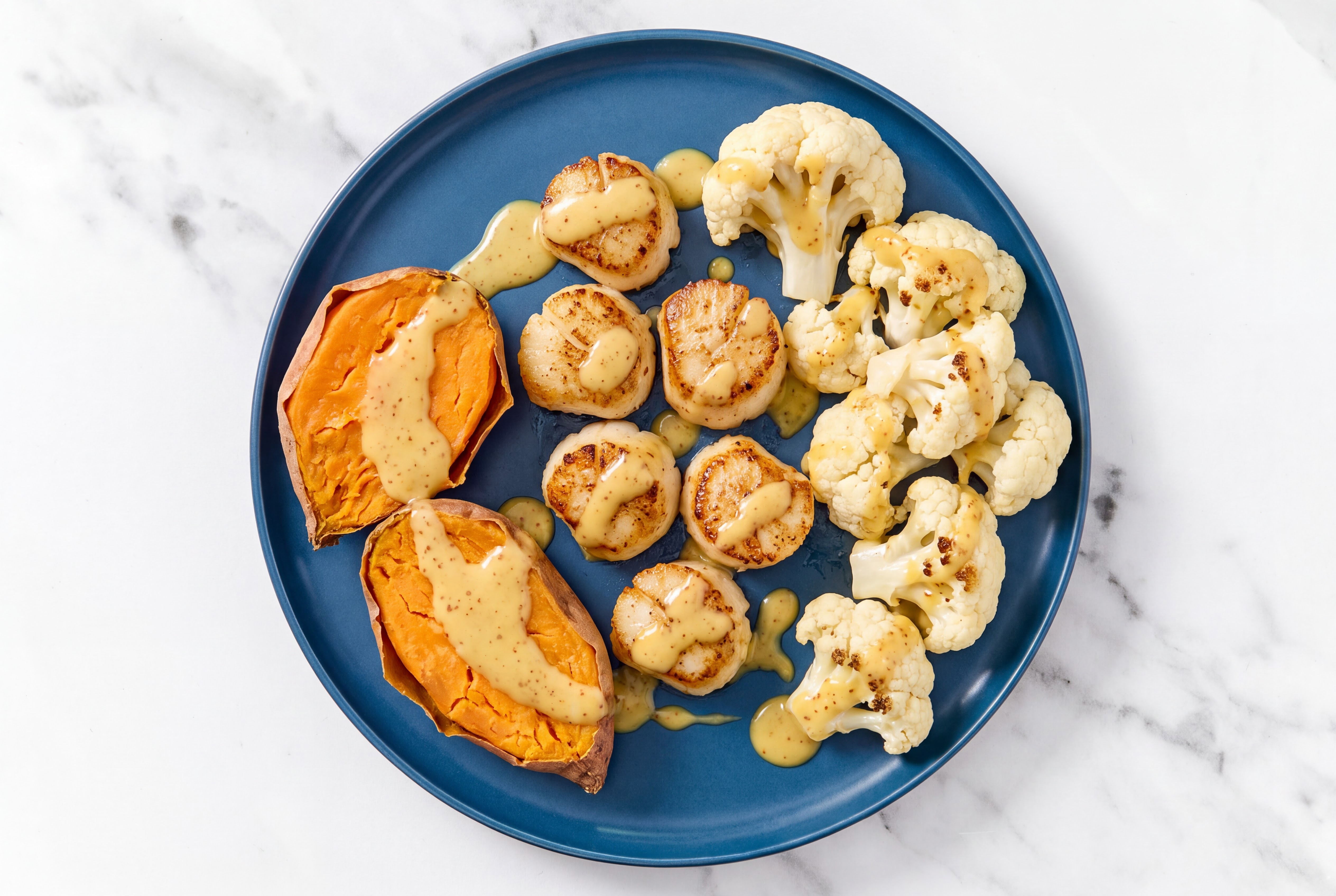 Honey Mustard Jumbo Scallops with Sweet Potato & Cauliflower