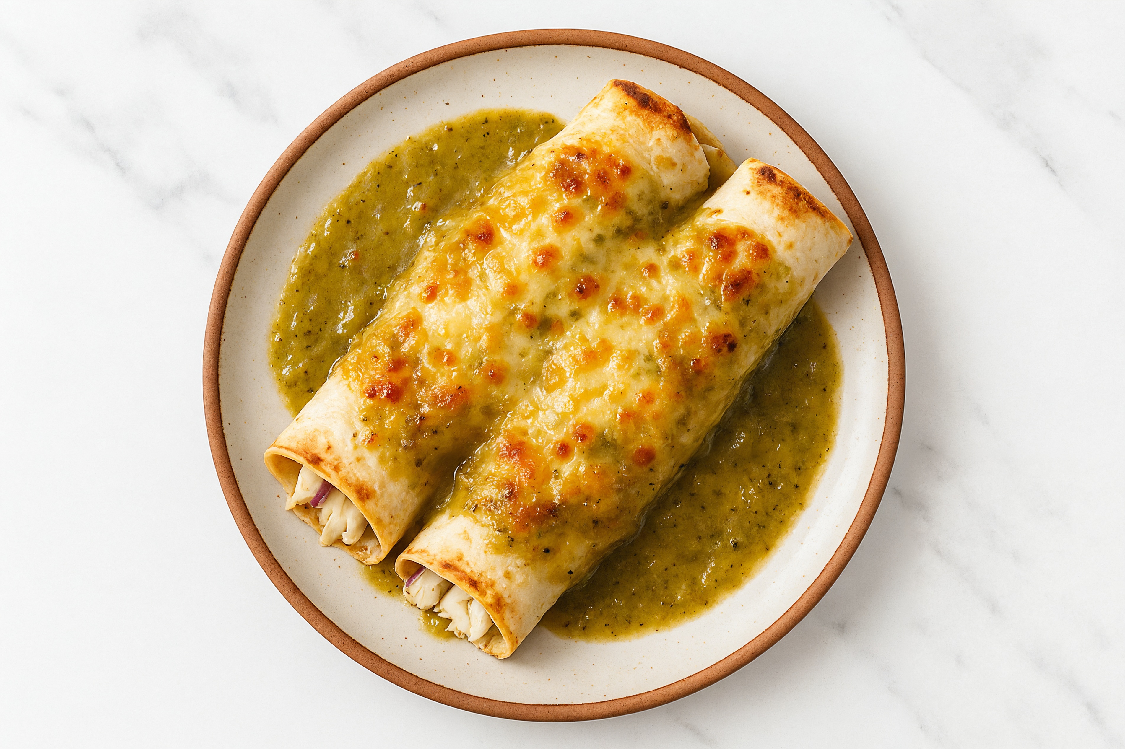 Cheesy Green Chile Cod Enchiladas with Shredded Mozzarella Cheese