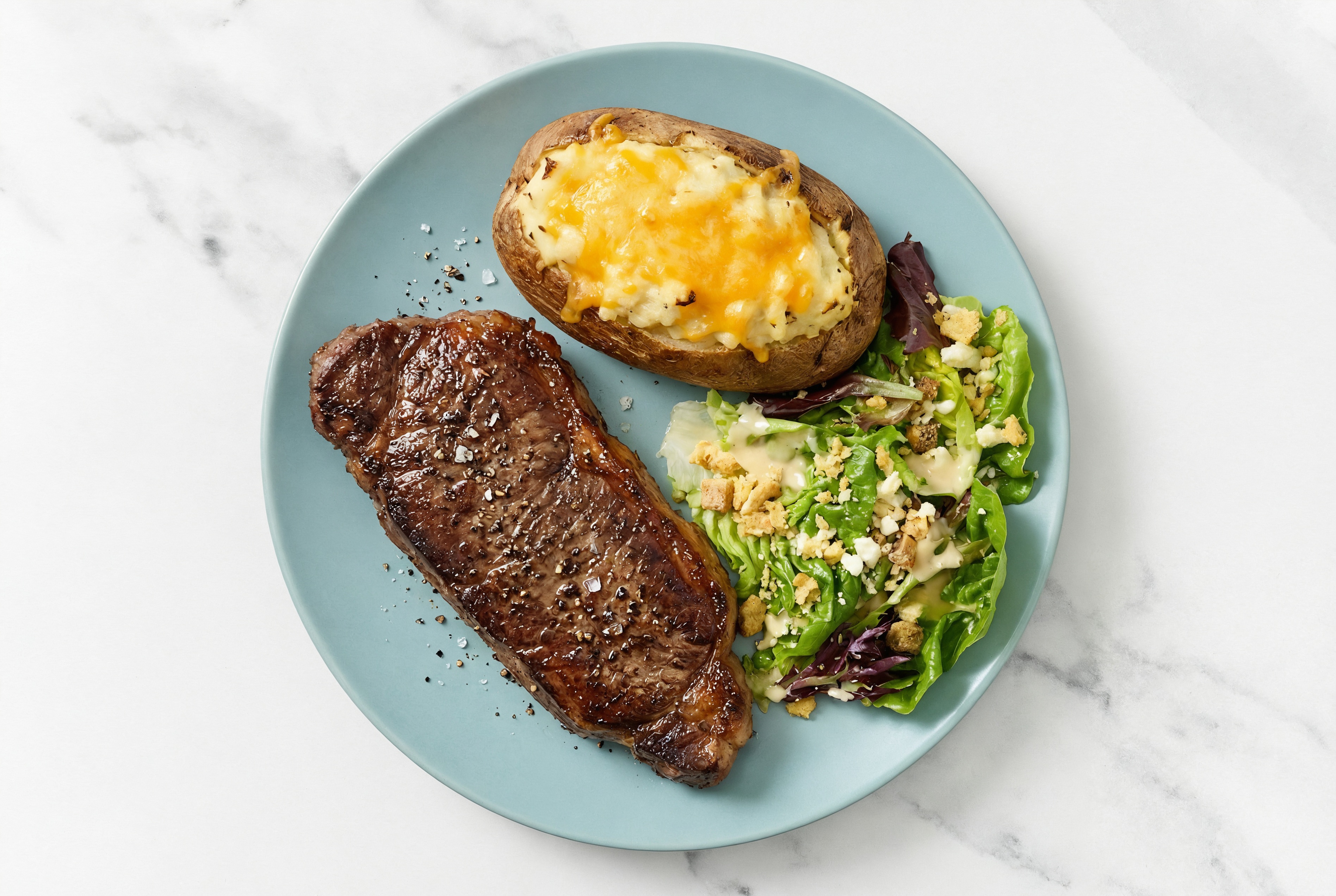 Wagyu Strip Steak with Little Gem Salad + Twice-Baked Potato