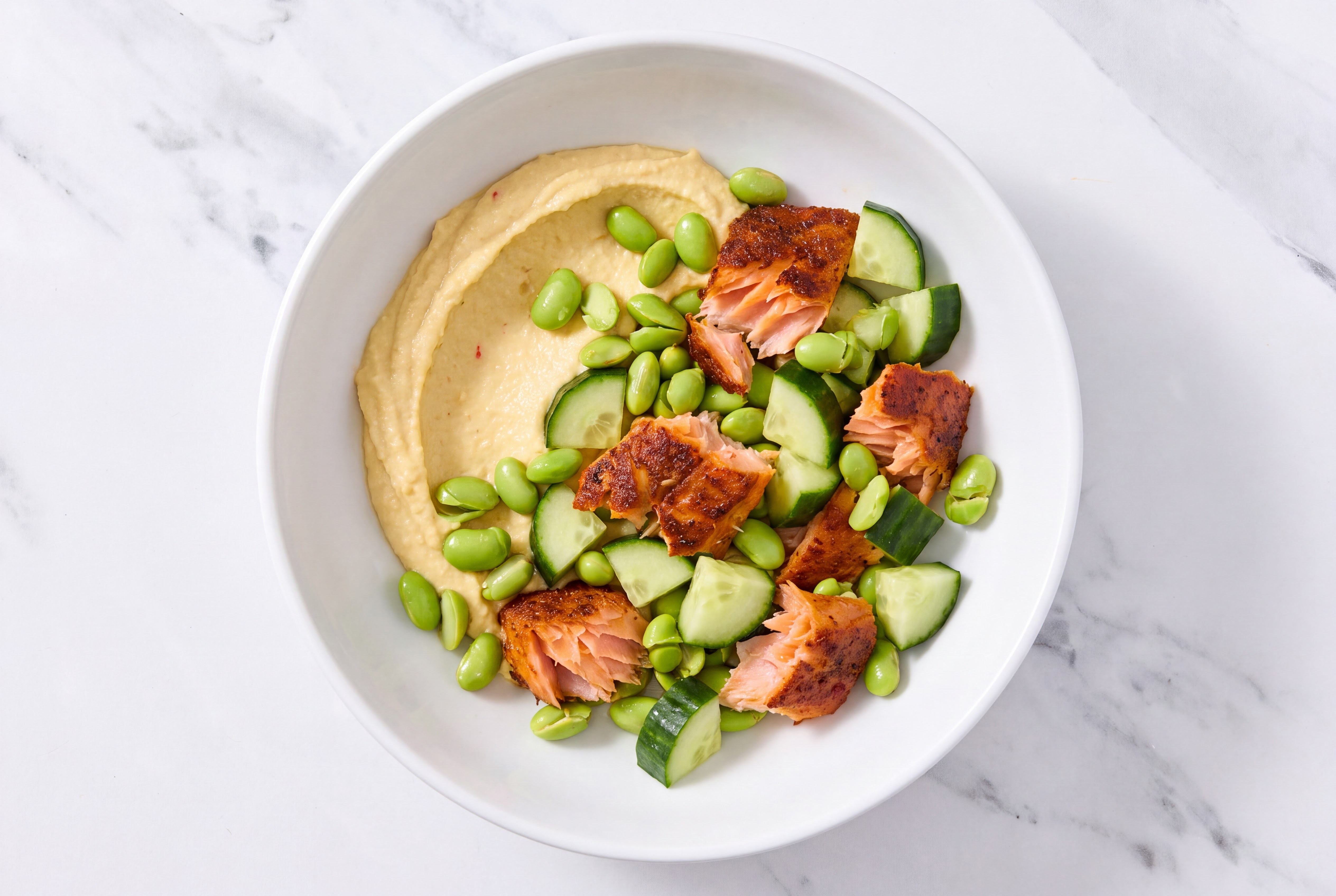 Blackened Salmon + Edamame Veggie Bowl with Lemon Garlic Hummus