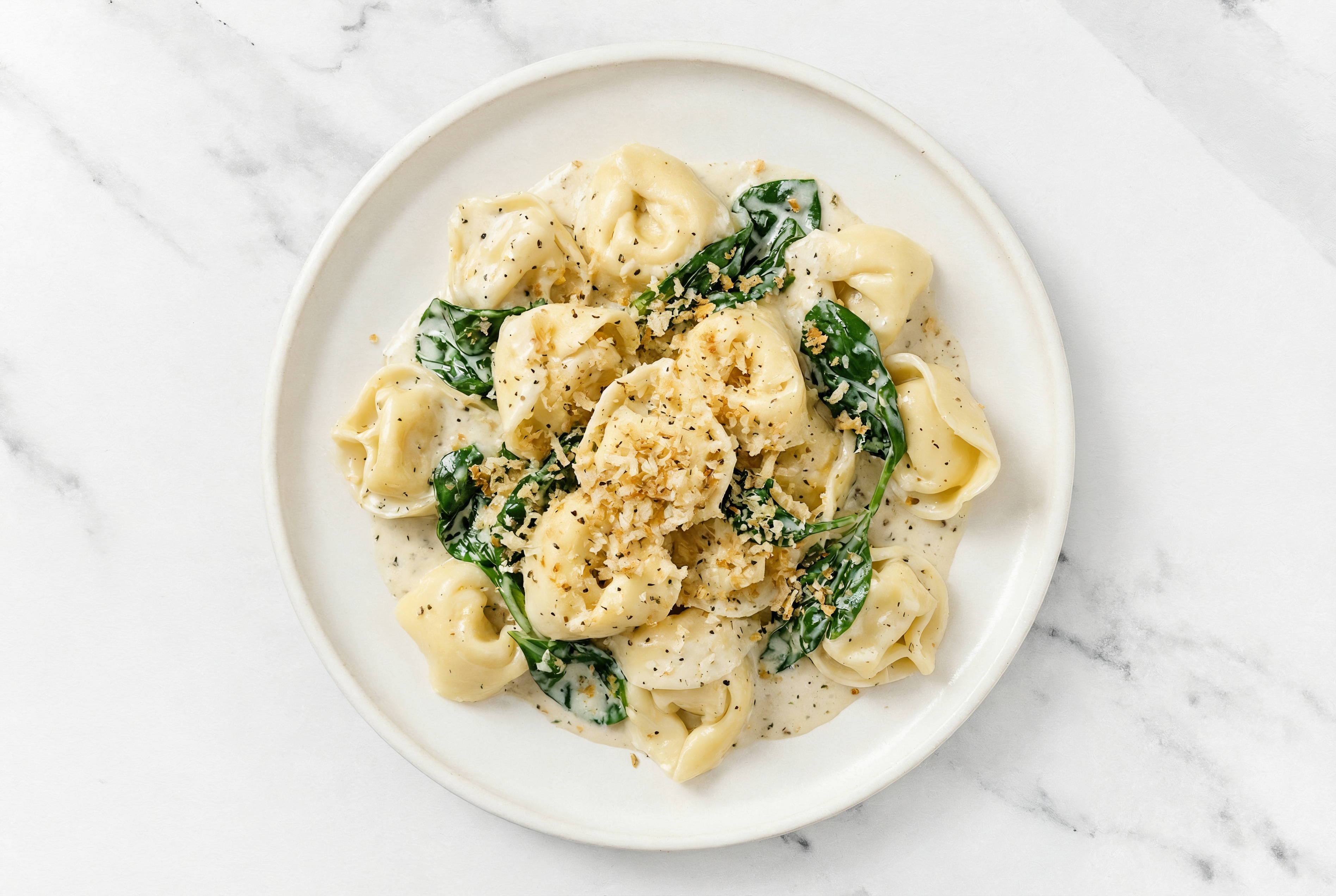 Cozy Creamed Spinach Tortelloni with Classic Alfredo